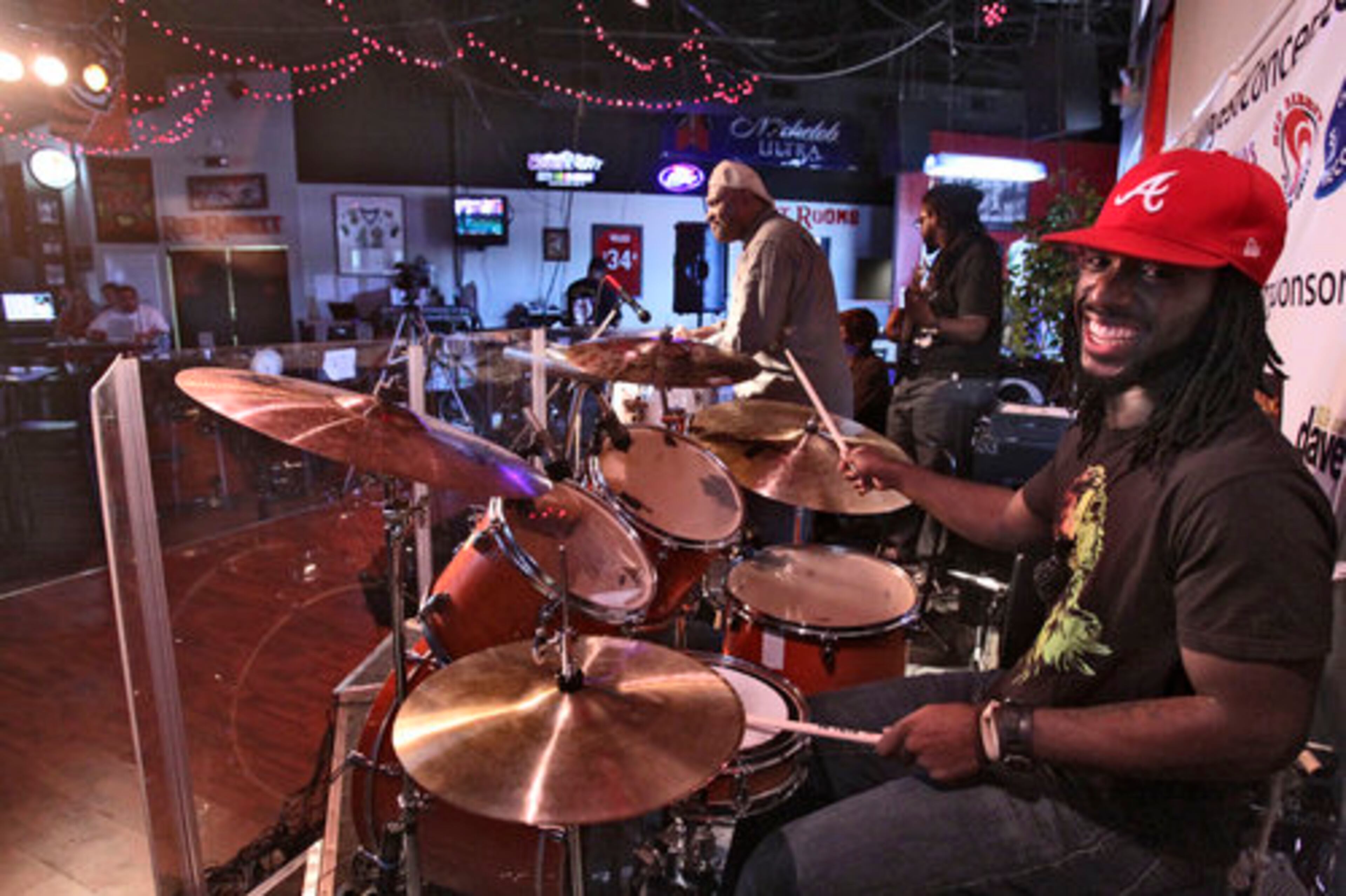 Walter Bland's "Climate Change" band had the stage at 10:30 am, playing to a small crowd. (l to r) Brady Speller, Joel Powell, and Josh Maker. Musicians have been performing around the clock at the Red Rabbit Pizza Pub in Johns Creek since July 10th.