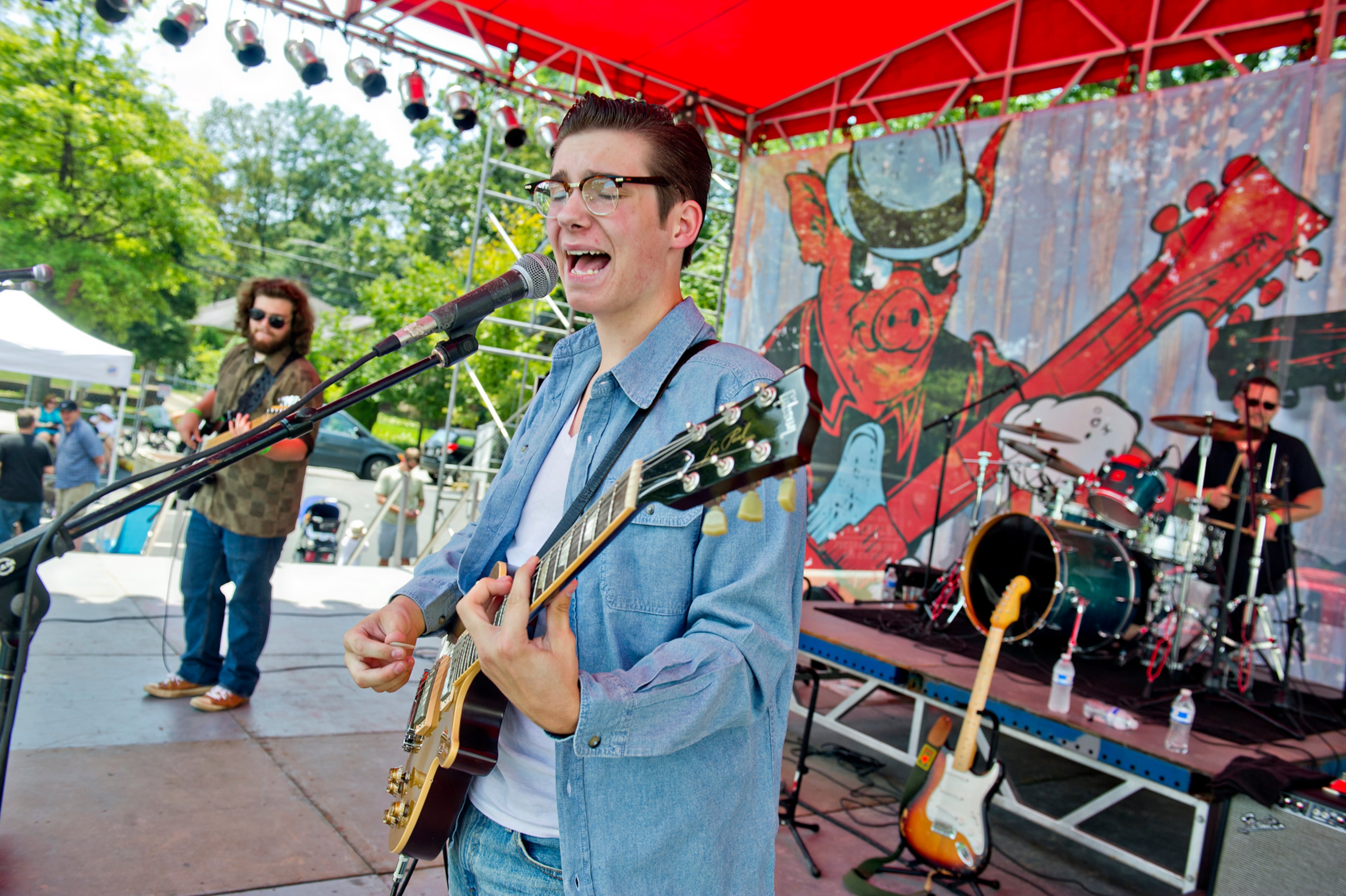 Brooks Mason (center), Lane Kelly (left) and Rich Simmons from the band The Georgia Flood perform during the Decatur BBQ, Blues & Bluegrass Festival at Harmony Park in Decatur on Saturday, August 16, 2014. The 14th annual festival featured over seven hours of blues and bluegrass performances as well as beer, barbeque and children's activities.