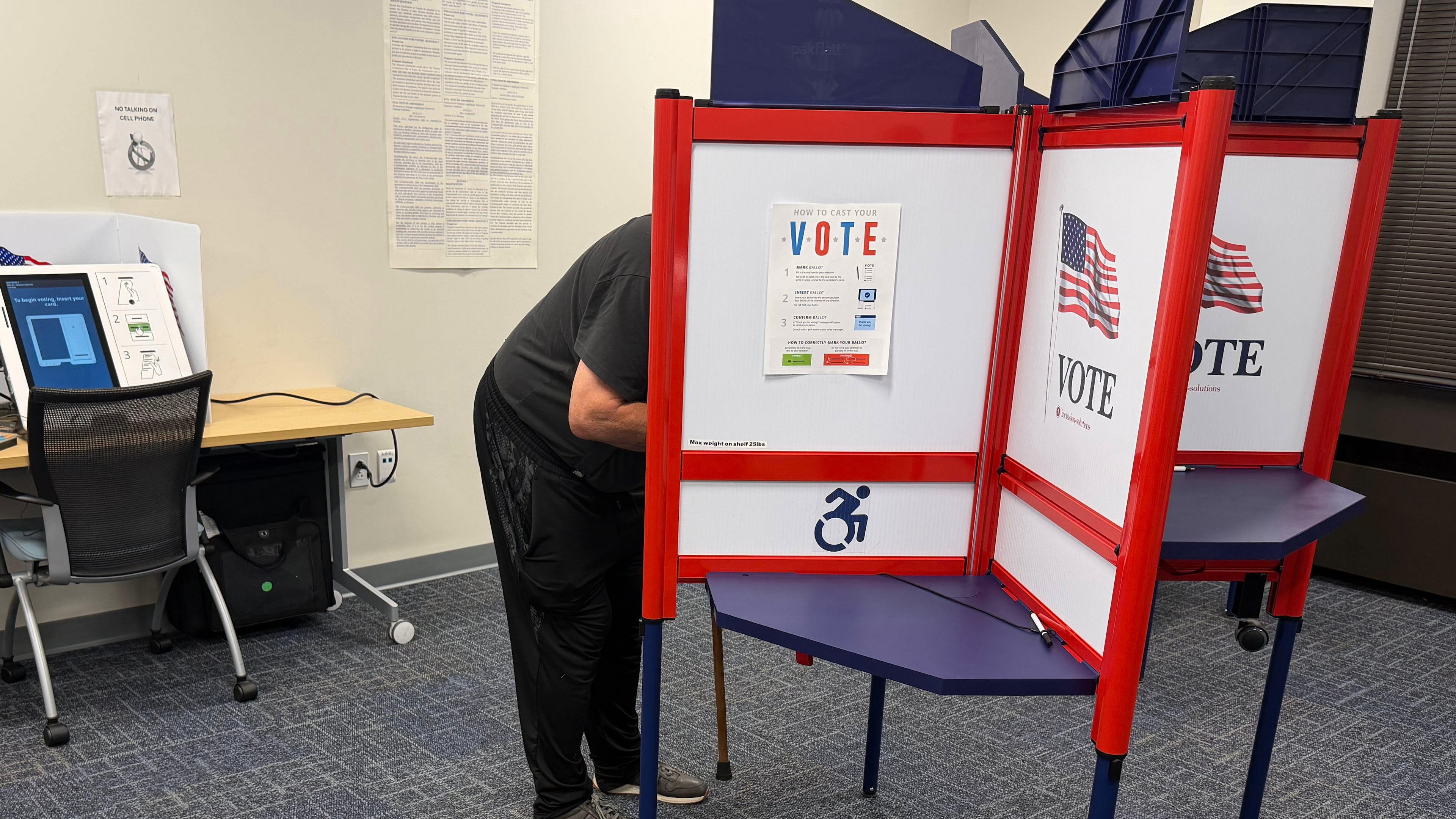 A voter casts a ballot in Henrico County, Va., on the first day of in-person early voting Friday, Sept. 18, 2026. (AP Photo/Sarah Rankin)