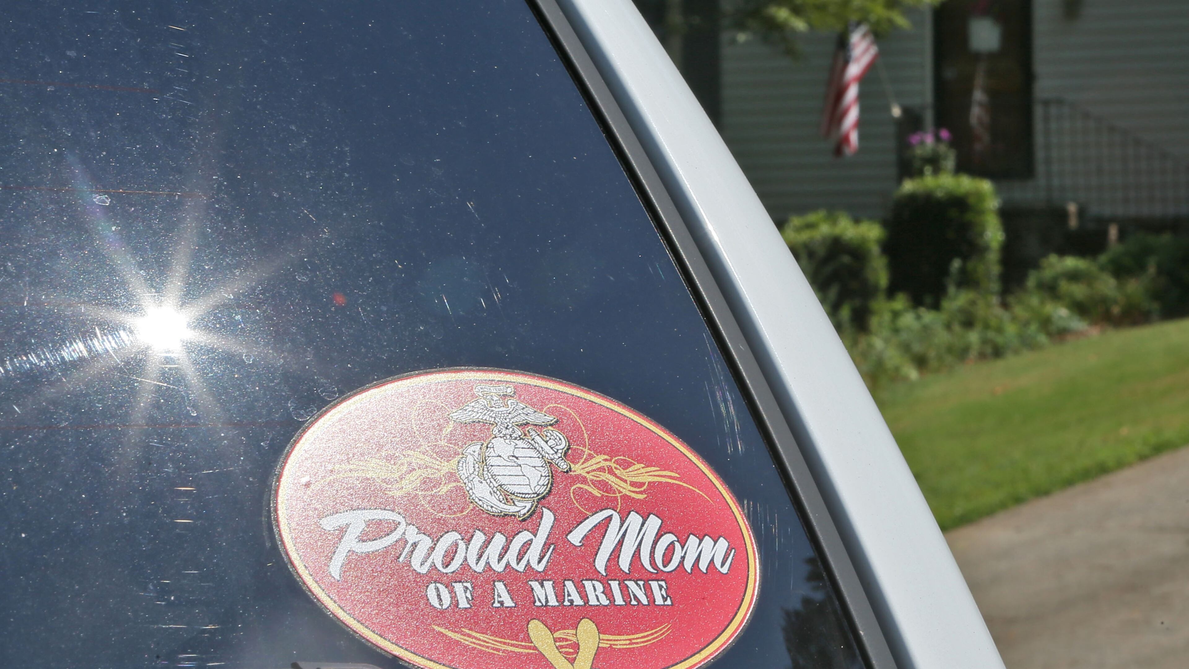 The vehicle parked in front of the Wells residence had stickers saying "Proud Mom of a Marine" and "My son is a U.S. Marine" and a U.S. flag hung from a pole on the front porch. Sprayberry High graduate and ROTC student Skip Wells was was one of the Marines killed in the Chattanooga shooting yesterday. A steady stream of visitors stopped by his mother's house this morning.
