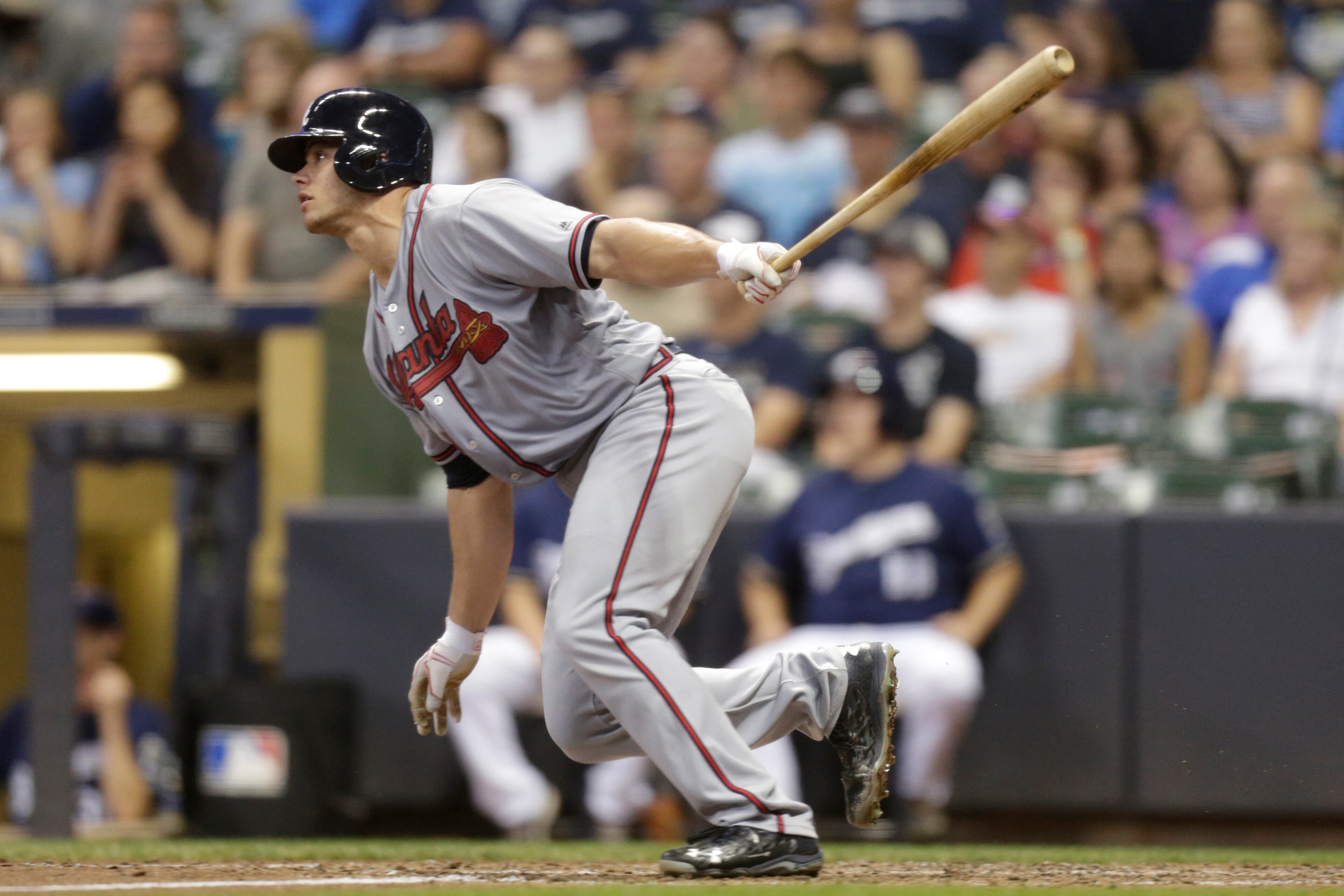 Anthony Recker #20 of the Atlanta Braves hits a singe during the sixth inning against the Milwaukee Brewers at Miller Park on August 09, 2016 in Milwaukee, Wisconsin. (Photo by Mike McGinnis/Getty Images)