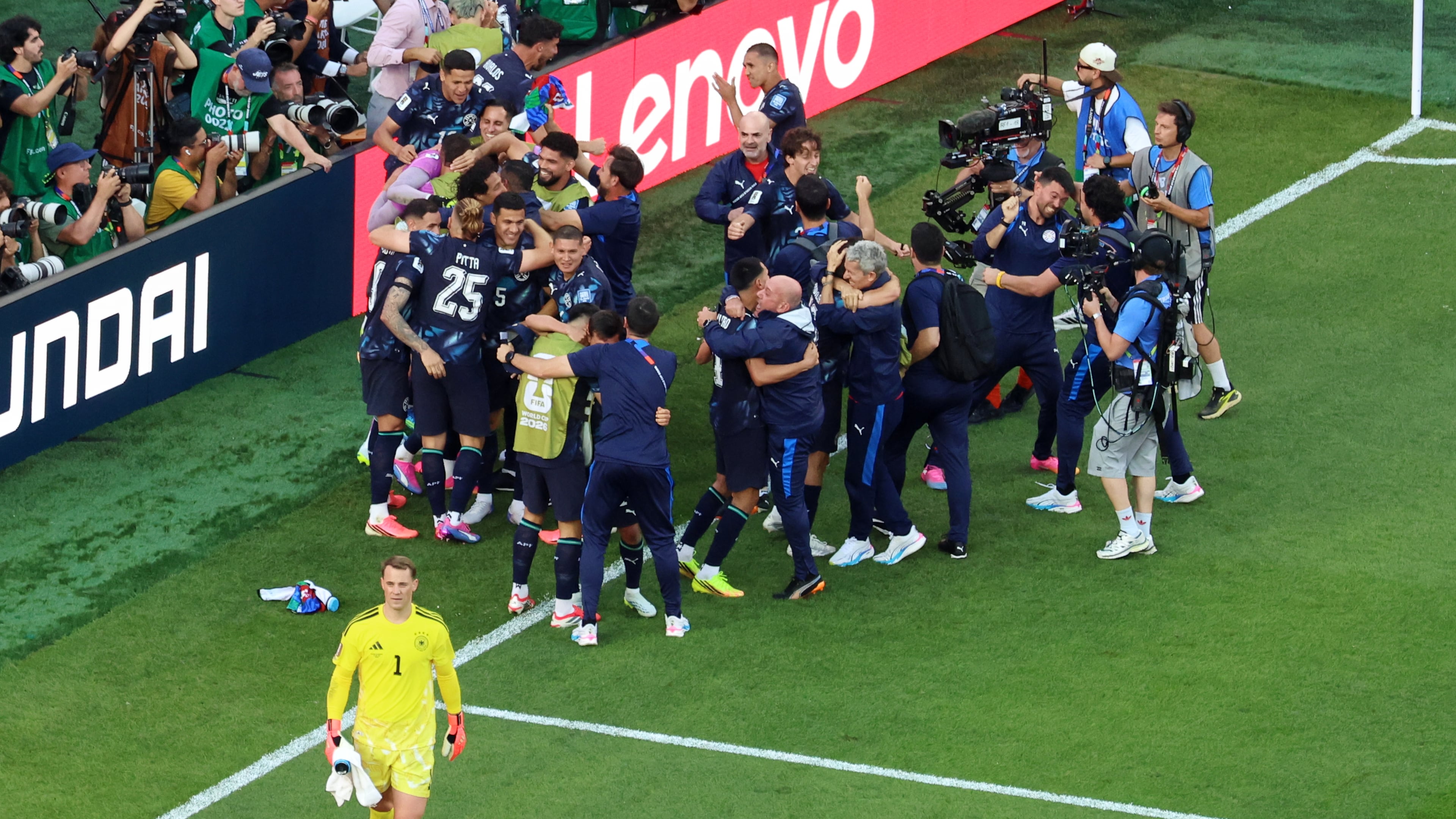 Germany goalkeeper Manuel Neuer (1) reacts as Paraguay players celebrate after a penalty shootout at the end of the World Cup round of 32 soccer match between Germany and Paraguay in Foxborough, Mass., near Boston, Monday, June 29, 2026. (AP Photo/Mark Stockwell)