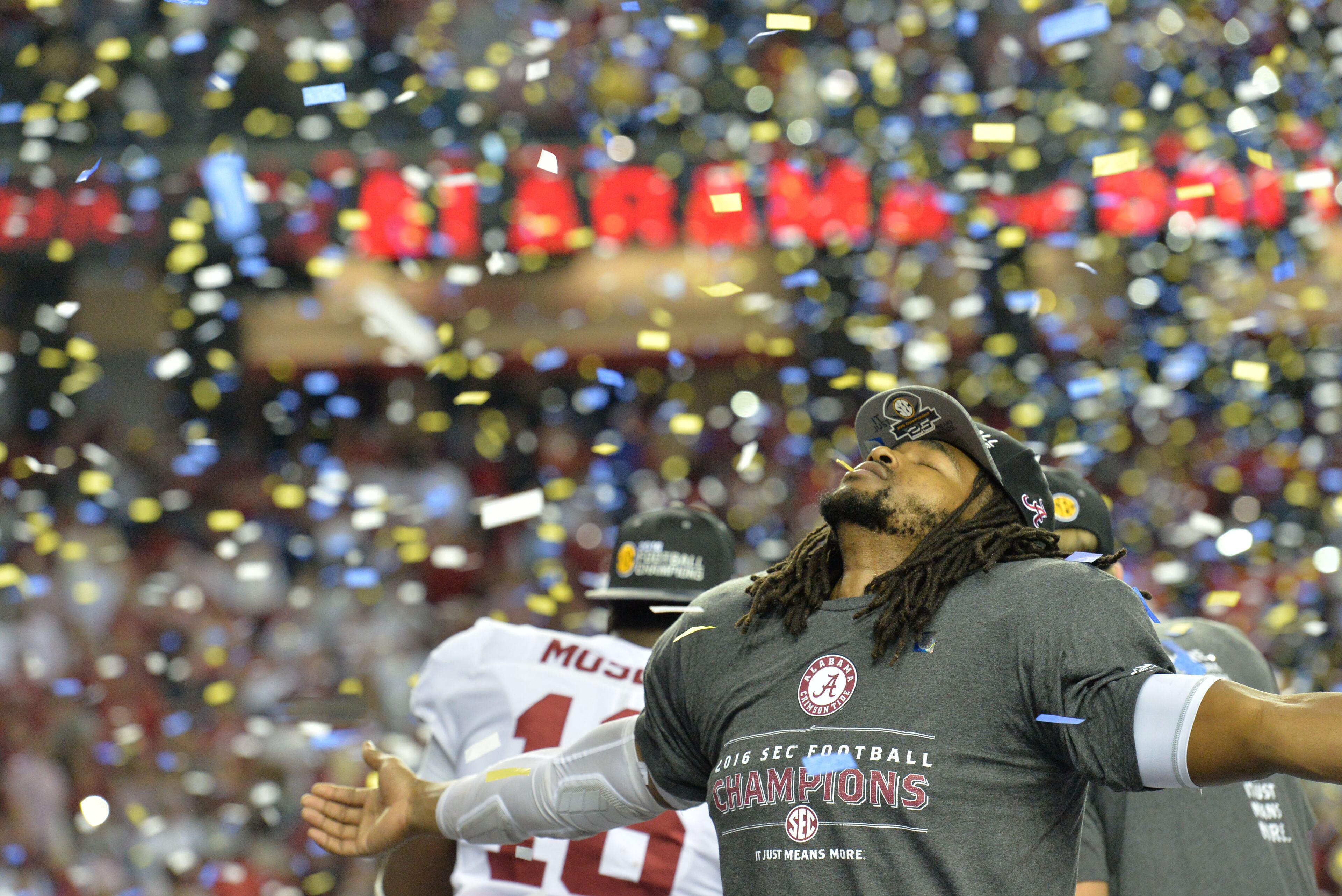 December 3, 2016 Atlanta - Alabama celebrates the SEC Championship win over the Florida at the Georgia Dome on Saturday, December 3, 2016. Alabama won 54 - 16 over the Florida. HYOSUB SHIN / HSHIN@AJC.COM