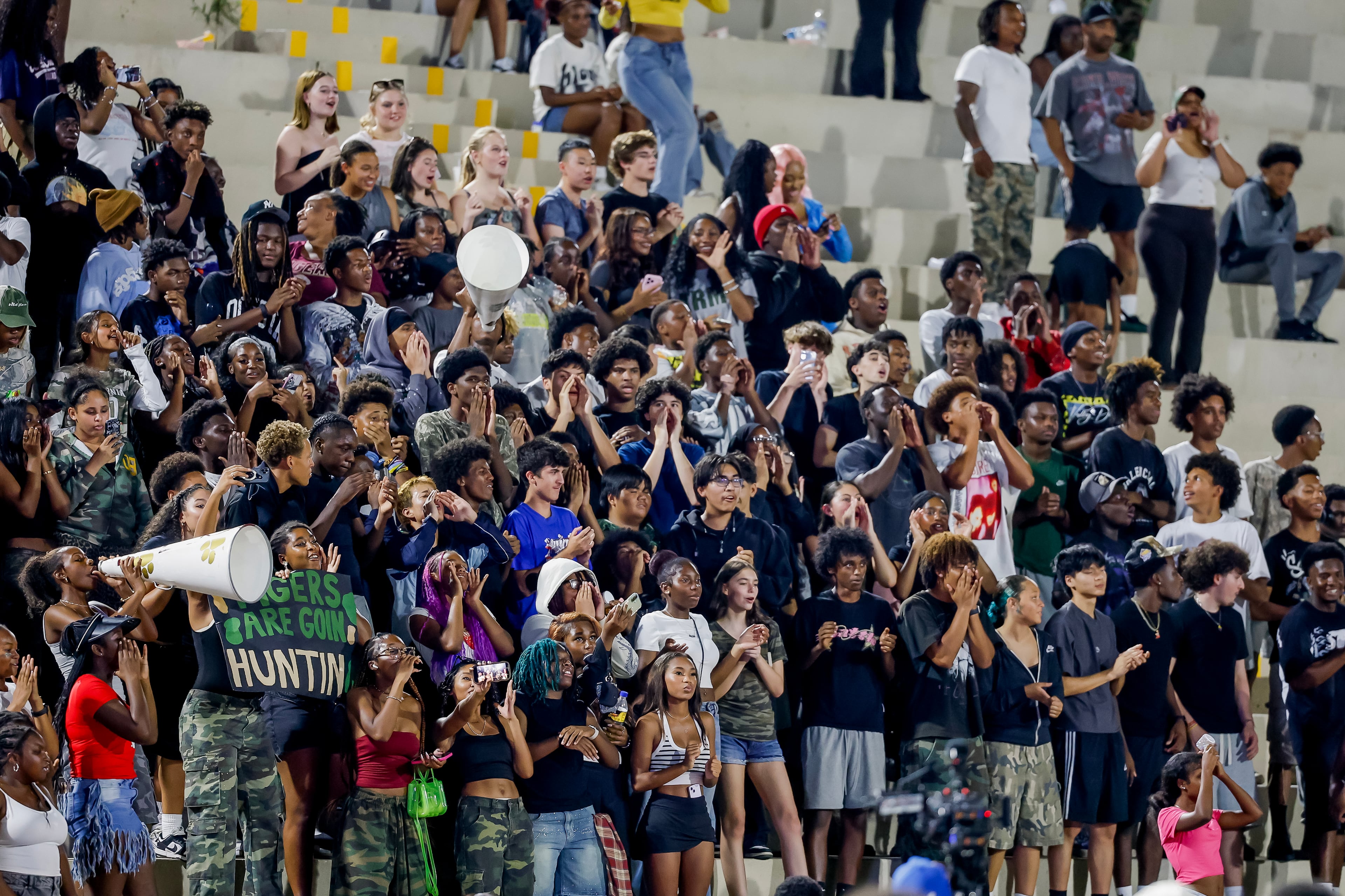 Tucker students and fans celebrate as their team defeats Stephenson in the closing seconds of their game at Hallford Stadium on Friday, Sept. 4, 2026, in Clarkston. (Erik S. Lesser for the AJC)