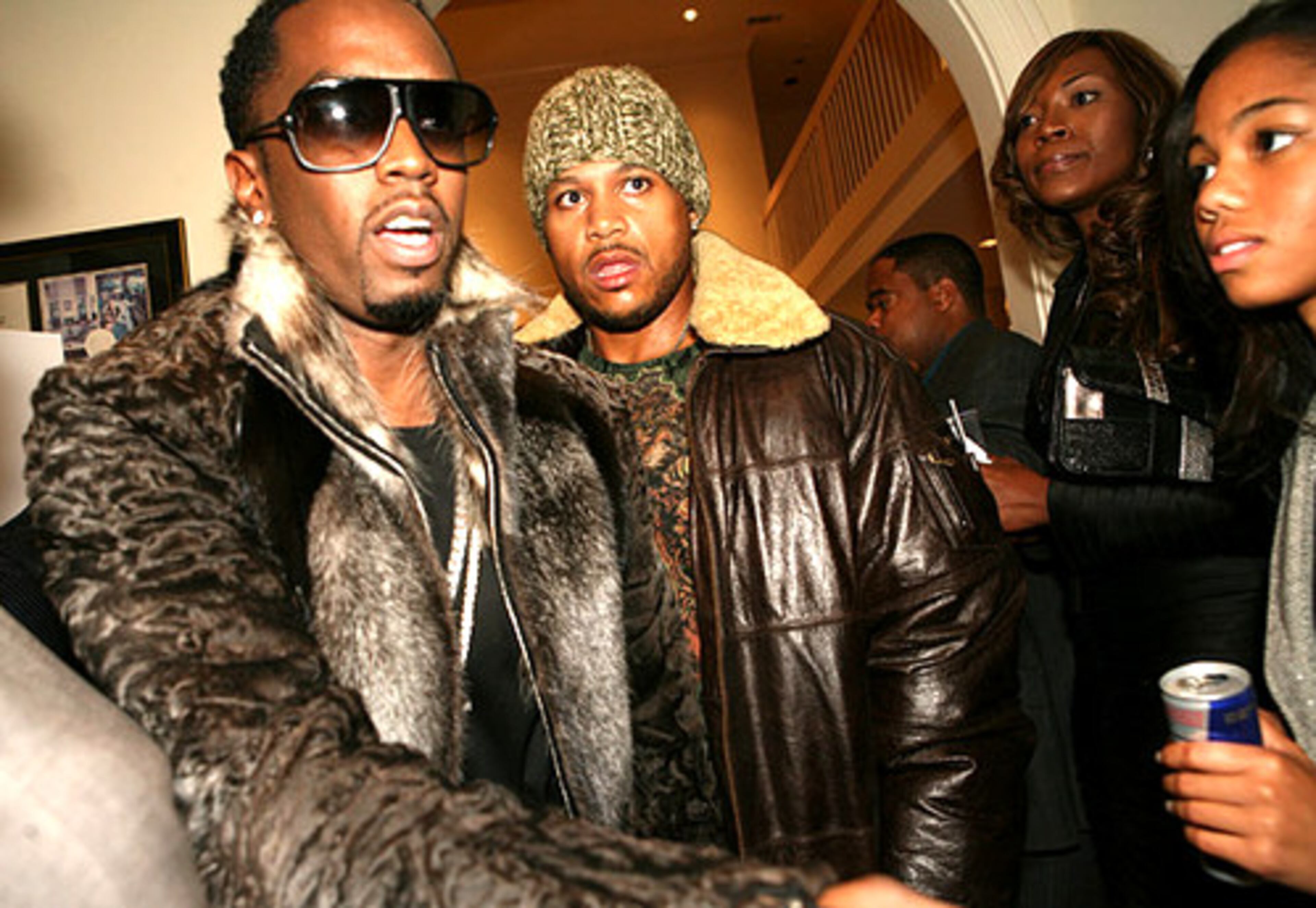 Hip hop mogul Sean "Diddy" Combs (left) makes a brief appearance during the event before performing the Up Close Tour at Philips Arena later that night.