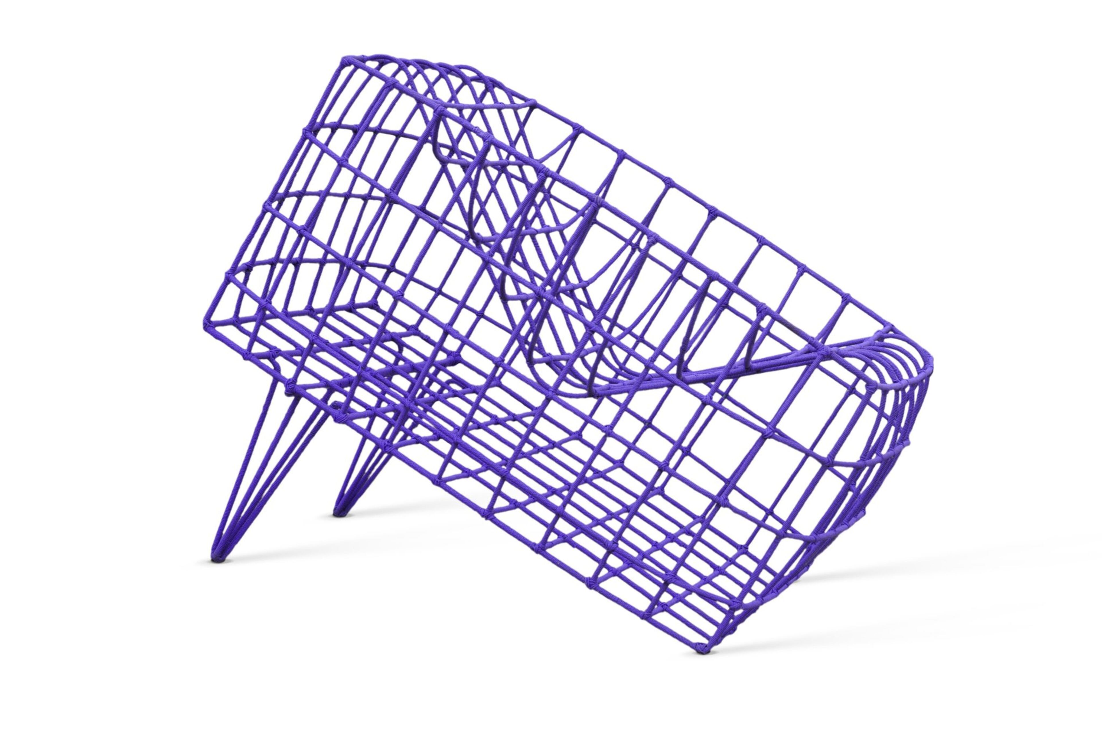 Malian artist Cheick Diallo’s Sansa armchair made from metal, nylon and cords from the collection of the Vitra Design Museum is featured in “Making Africa.”