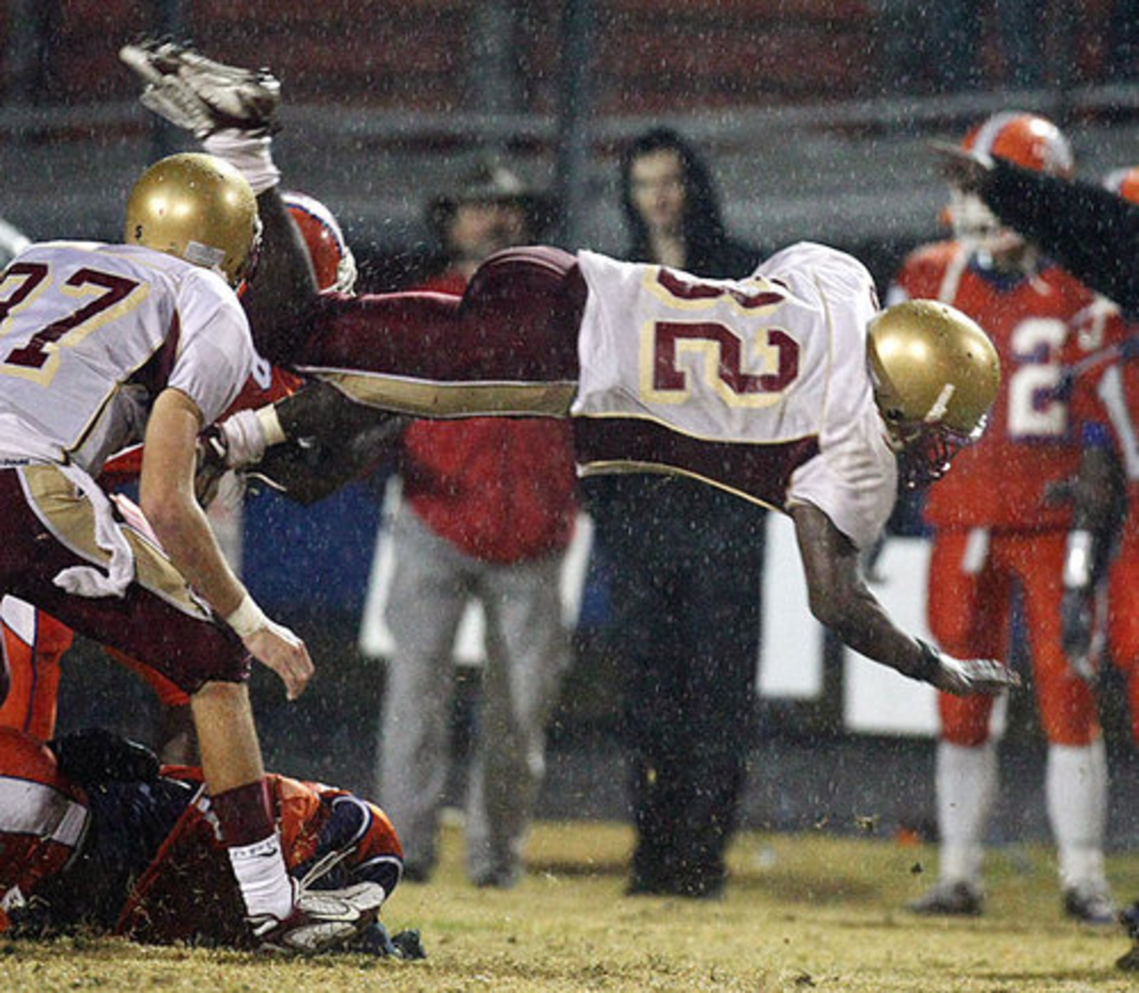 Brookwood running back #32 Allen McCray soars for extra yardage.