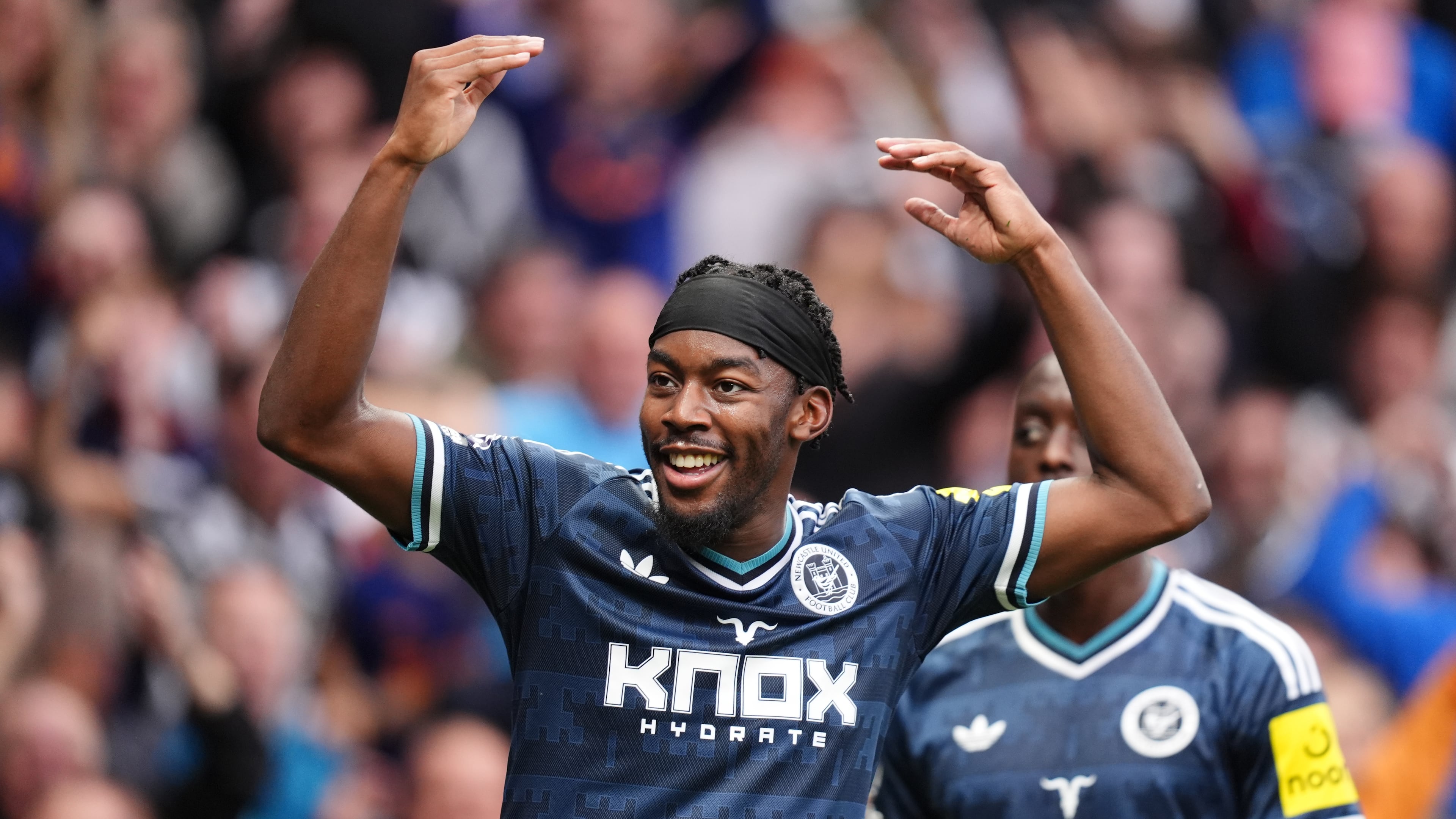 Newcastle United's Anthony Elanga celebrates scoring their side's first goal during the British Premier League soccer match between Newcastle United and Tottenham Hotspur, in London, Saturday Aug. 29, 2026. (John Walton/PA via AP)