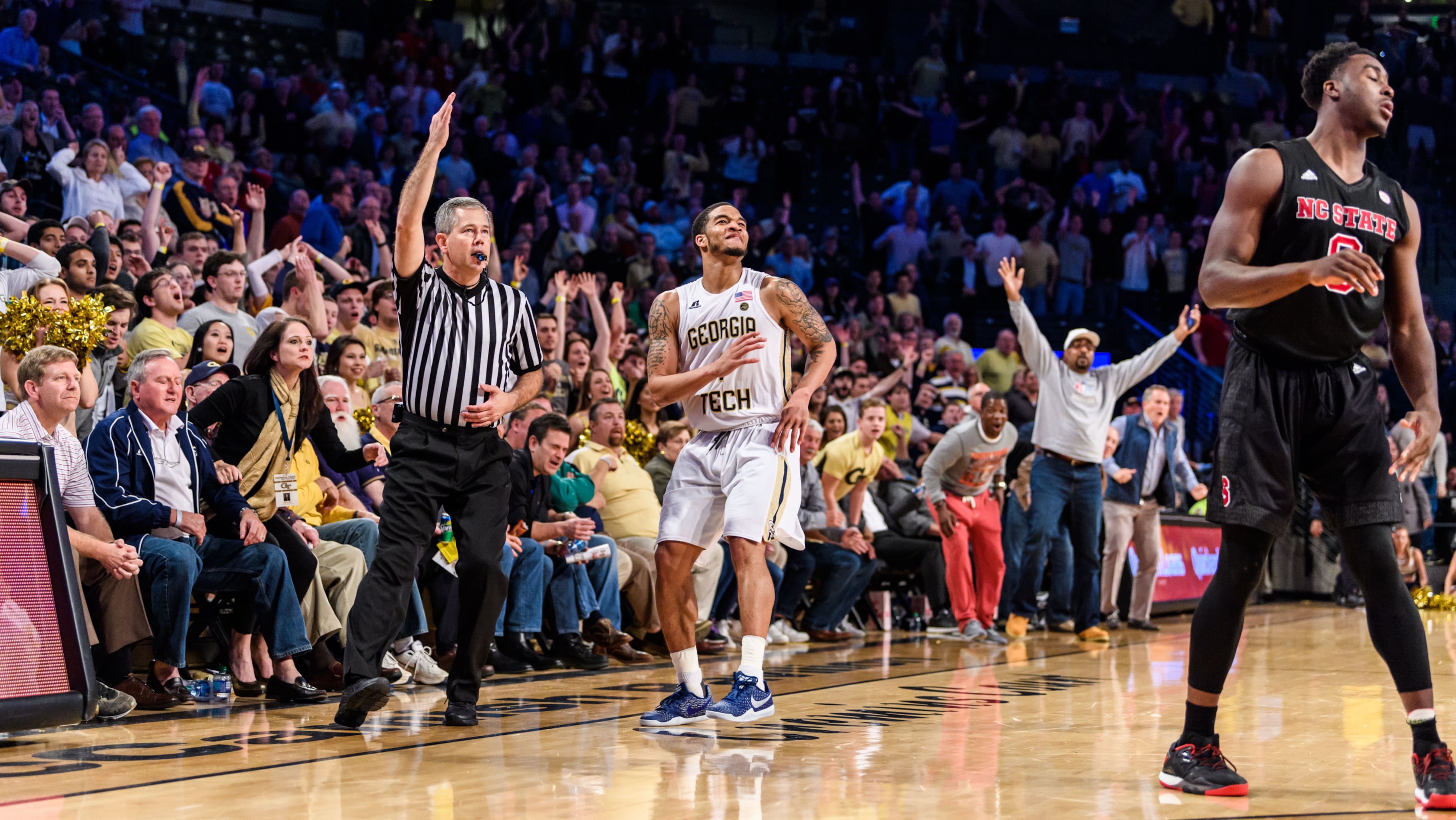 Georgia Tech guard Tadric Jackson reacts after his buzzer-beating 3-point attempt was off the mark. Tech great Dennis Scott, in the background, was hopeful for a different result. (GT Athletics/Danny Karnik)