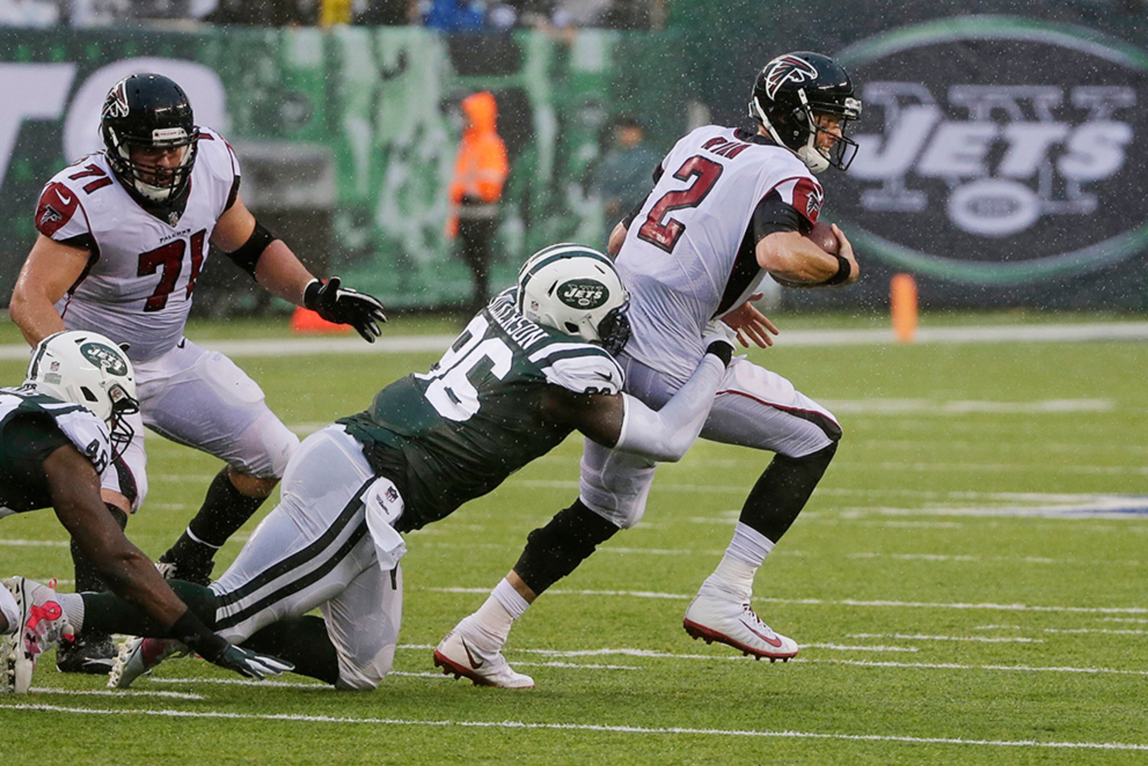 New York Jets defensive end Muhammad Wilkerson (96) sacks Atlanta Falcons quarterback Matt Ryan (2) during the first half of an NFL football game Sunday, Oct. 29, 2017, in East Rutherford, N.J. (AP Photo/Seth Wenig)