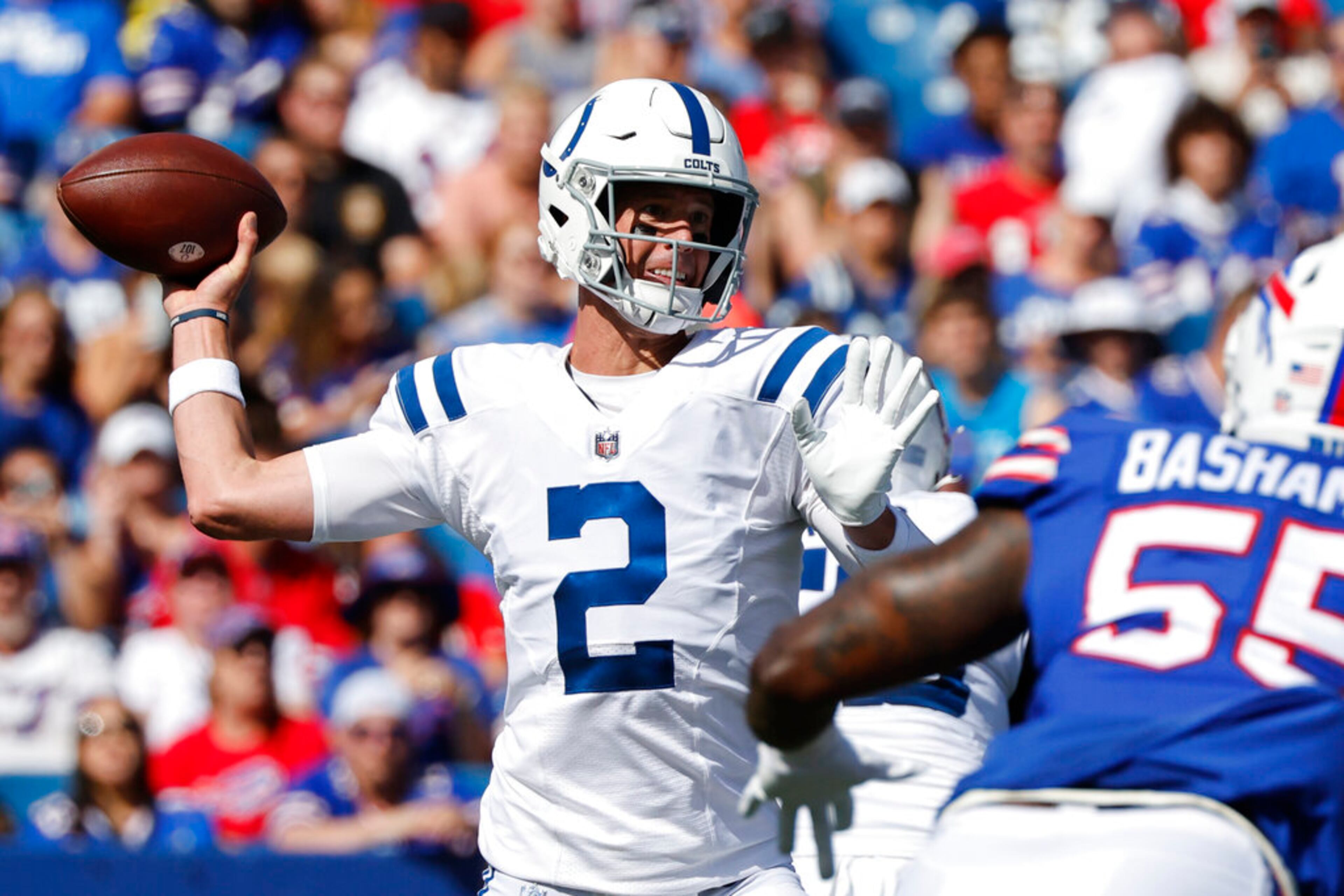 Indianapolis Colts quarterback Matt Ryan (2) passes under pressure from Buffalo Bills defensive end Boogie Basham (55) during the first half of a preseason NFL football game, Saturday, Aug. 13, 2022, in Orchard Park, N.Y. (AP Photo/Jeffrey T. Barnes)
