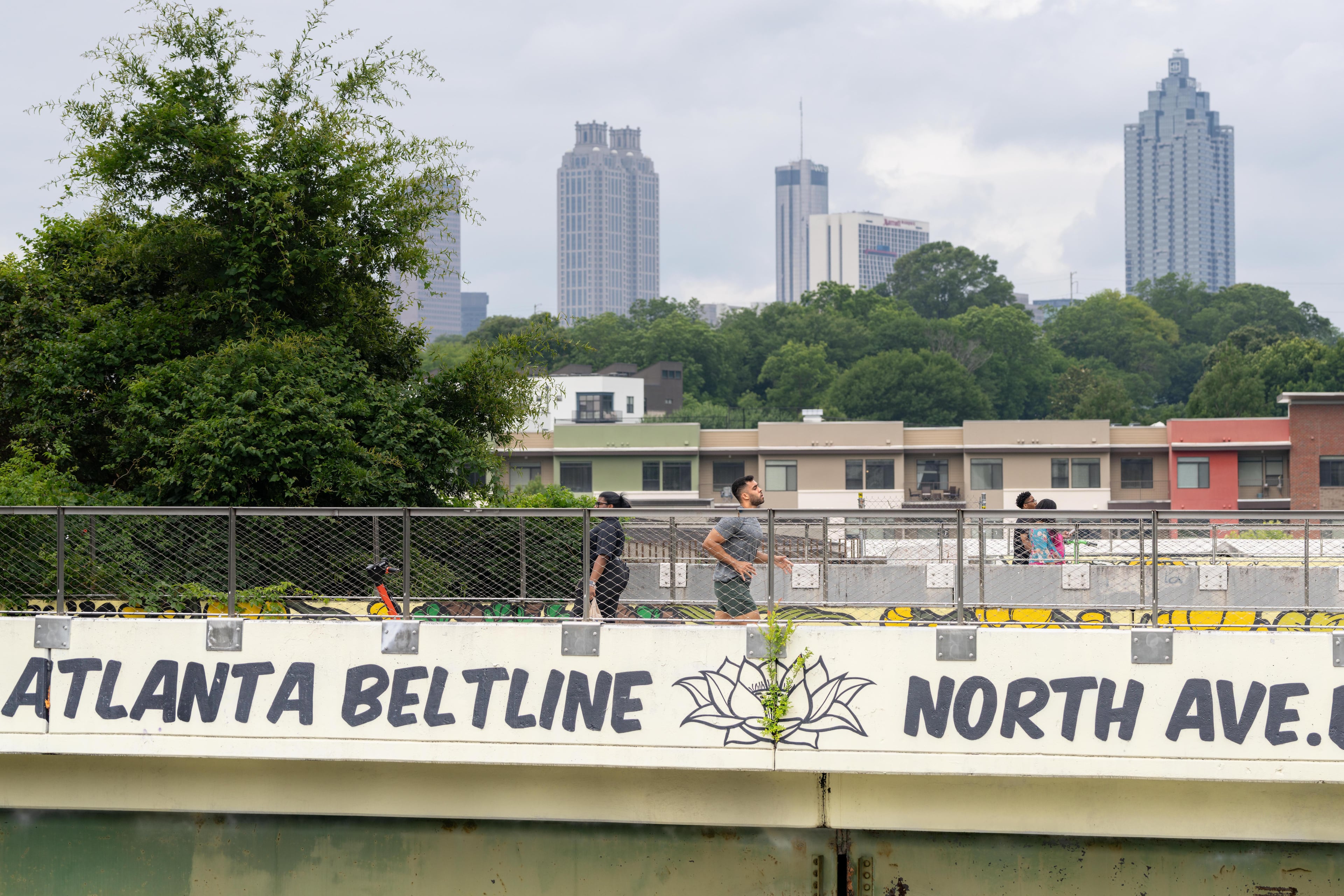 Atlantans use the beltline trail above North Avenue during mild temperatures in downtown Atlanta. Wednesday, May 4, 2025 (Ben Hendren for the Atlanta Journal-Constitution)