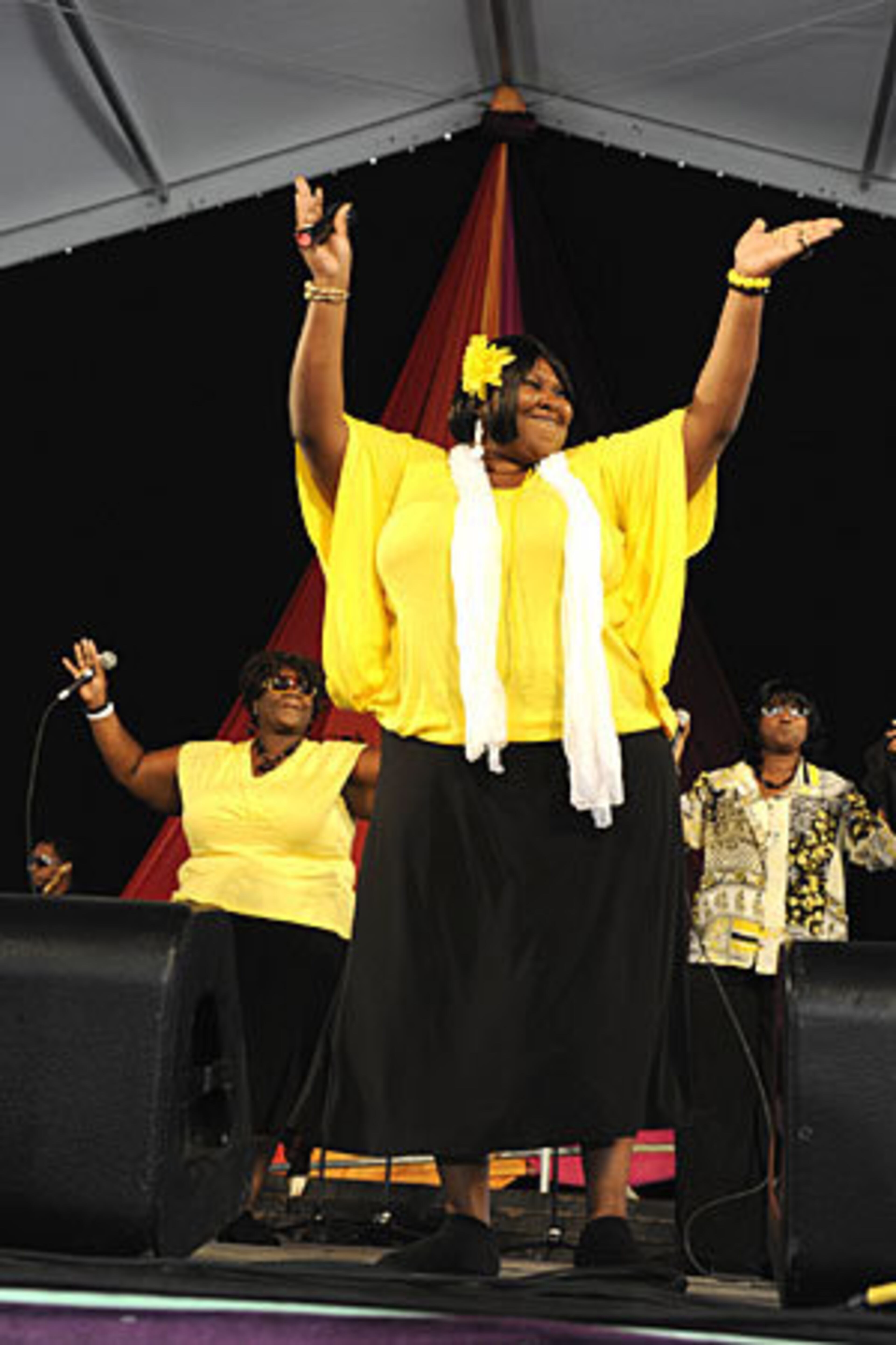 The Anointed Jackson Sisters perform in the Gospel Tent. Among this year's headline acts are Bon Jovi, Neil Young, Kings of Leon and Atlanta's own award-winning country duo Sugarland.