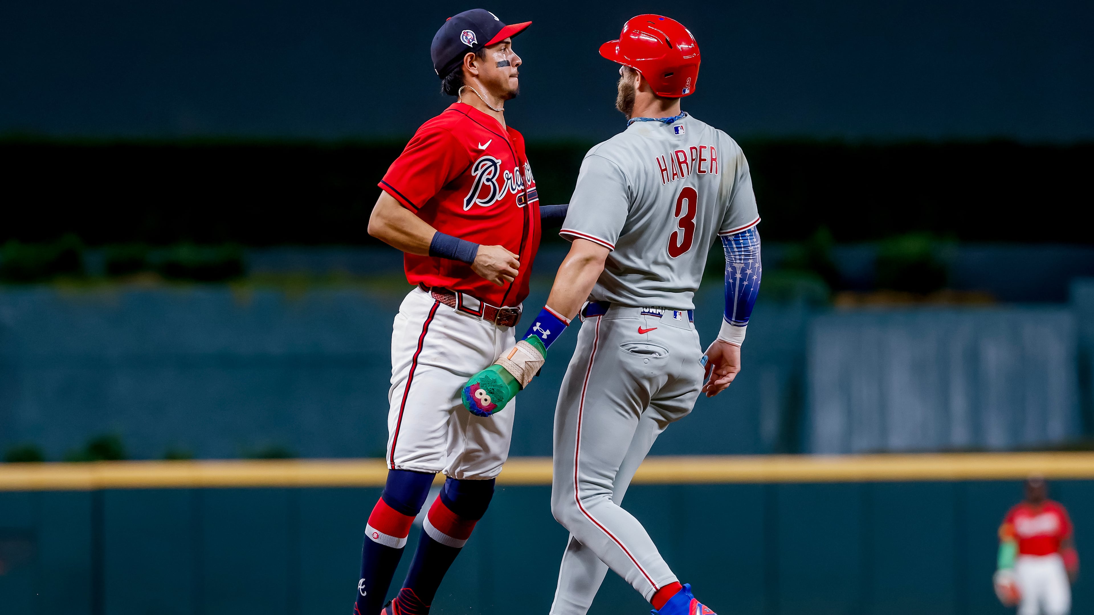 Philadelphia Phillies' Bryce Harper (right) is tagged out by Atlanta Braves shortstop Mauricio Dubón (left) during the ninth inning of a baseball game, Friday, Sept. 11, 2026, in Atlanta. (Erik S. Lesser/AP)
