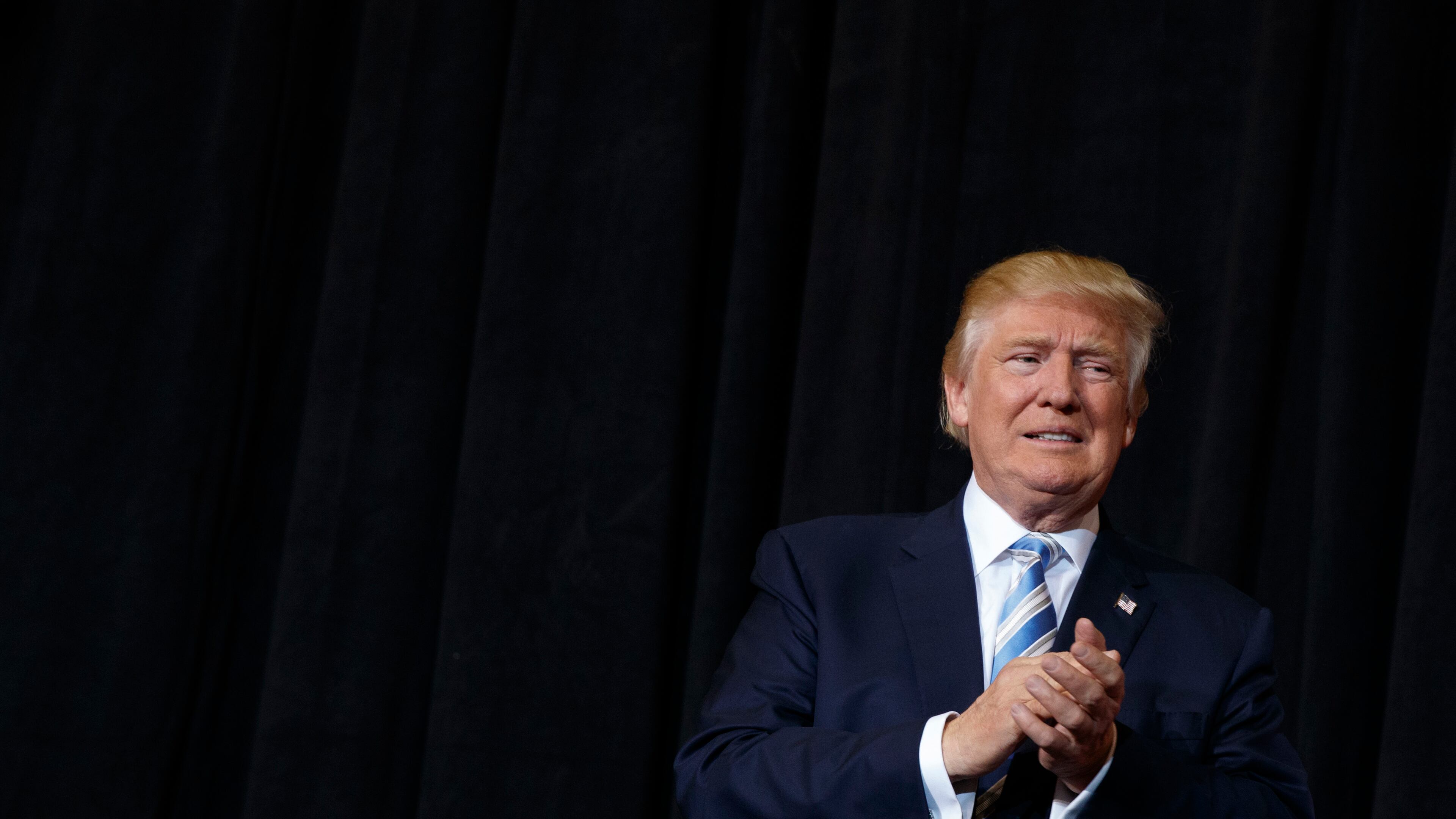 FILE - In this Nov. 7, 2016 file photo, Donald Trump arrives to speak at a campaign rally in Sarasota, Fla. Trump’s disavowal this week of white supremacists who have cheered his election as president hasn’t quieted concerns about the movement’s impact on his White House or whether more acts of hate will be carried out in his name. (AP Photo/ Evan Vucci, File)