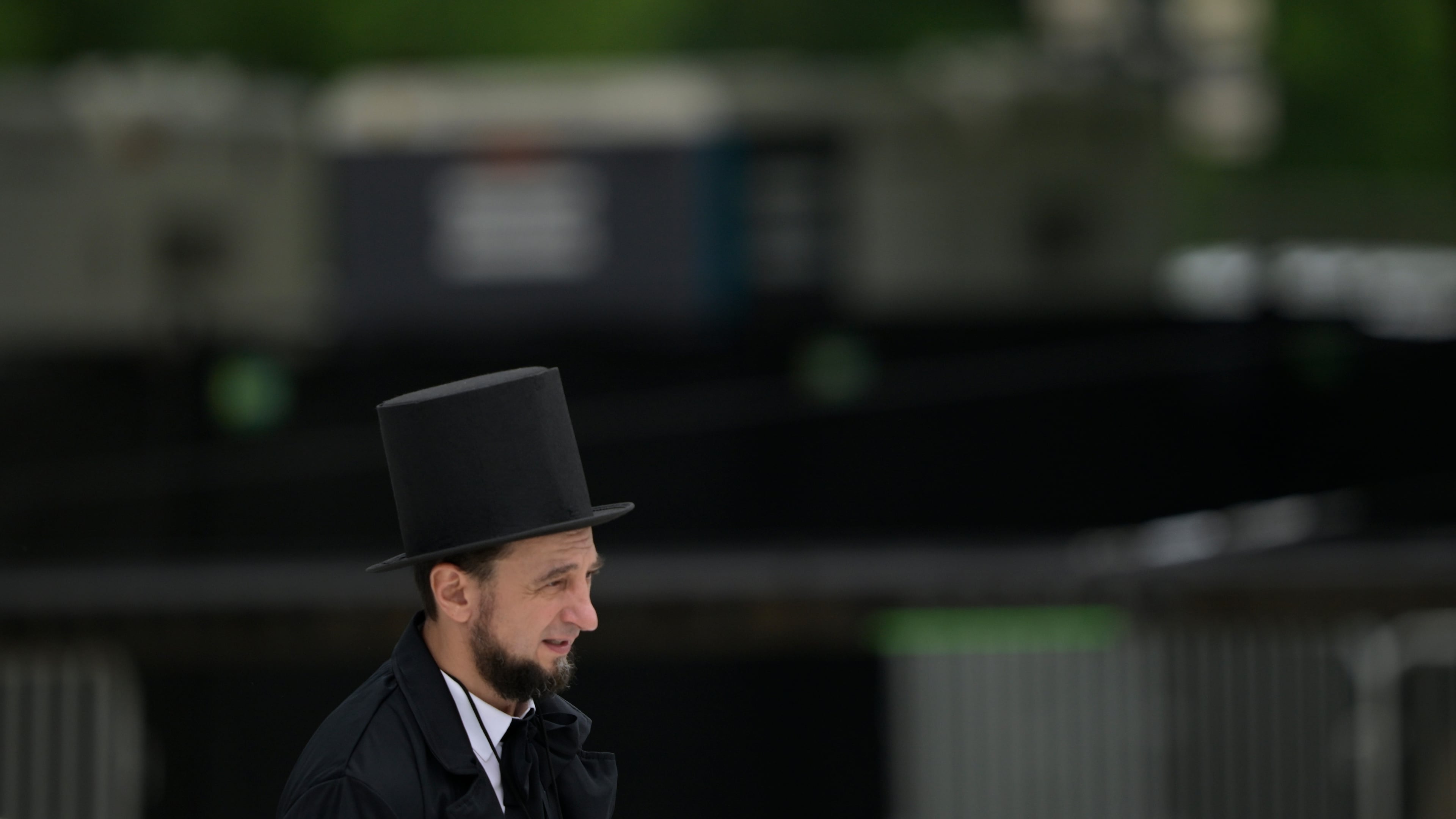 A guest dressed as Abraham Lincoln attends the Rededicate 250: A National Jubilee Of Prayer, Praise & Thanksgiving, Sunday, May 17, 2026, in Washington. (AP Photo/Rod Lamkey, Jr.)