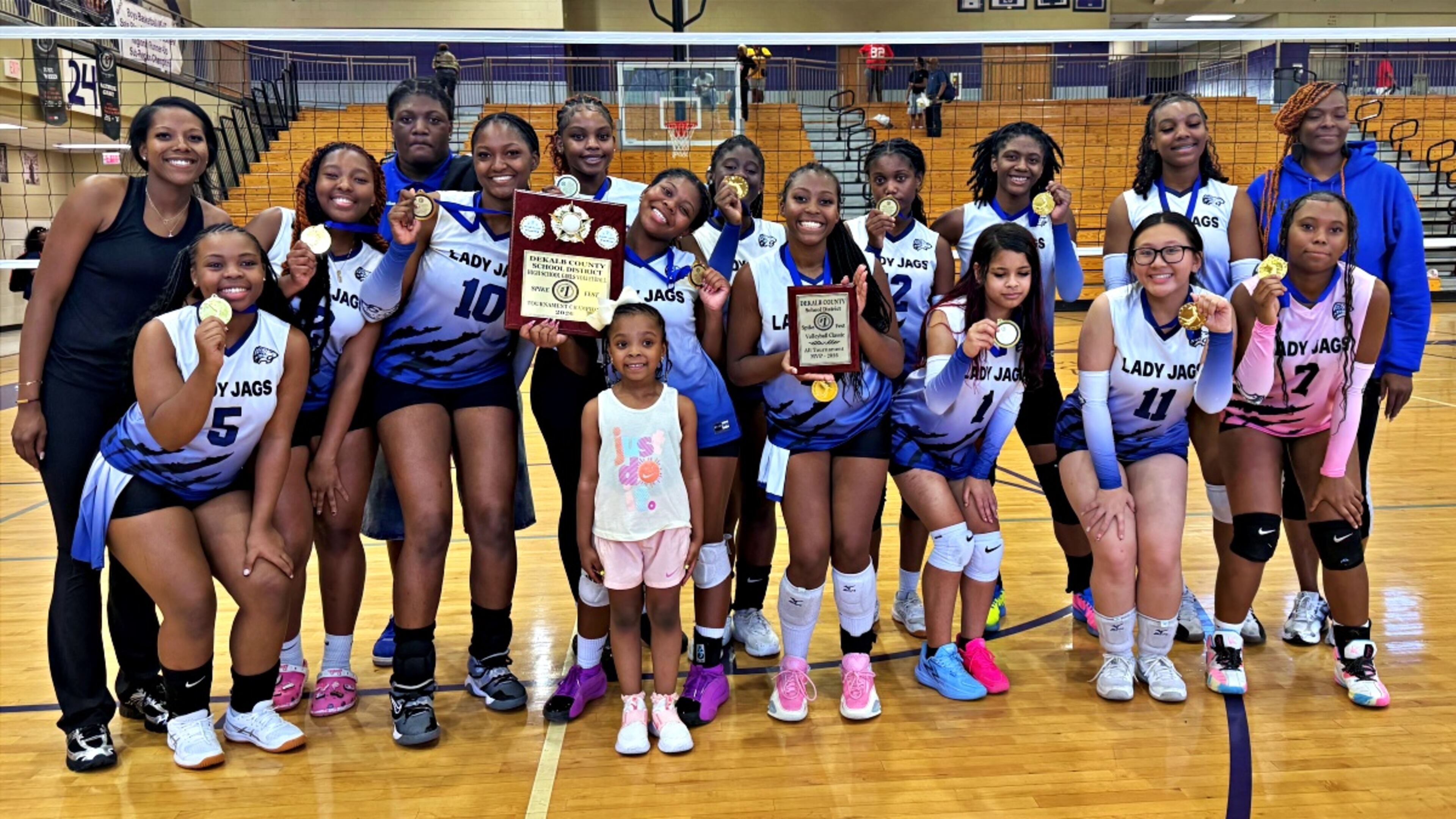 The Stephenson volleyball team celebrates after winning the DeKalb County Spikefest Volleyball Bracket at Miller Grove for the second straight year. (Courtesy of DeKalb County Athletics)