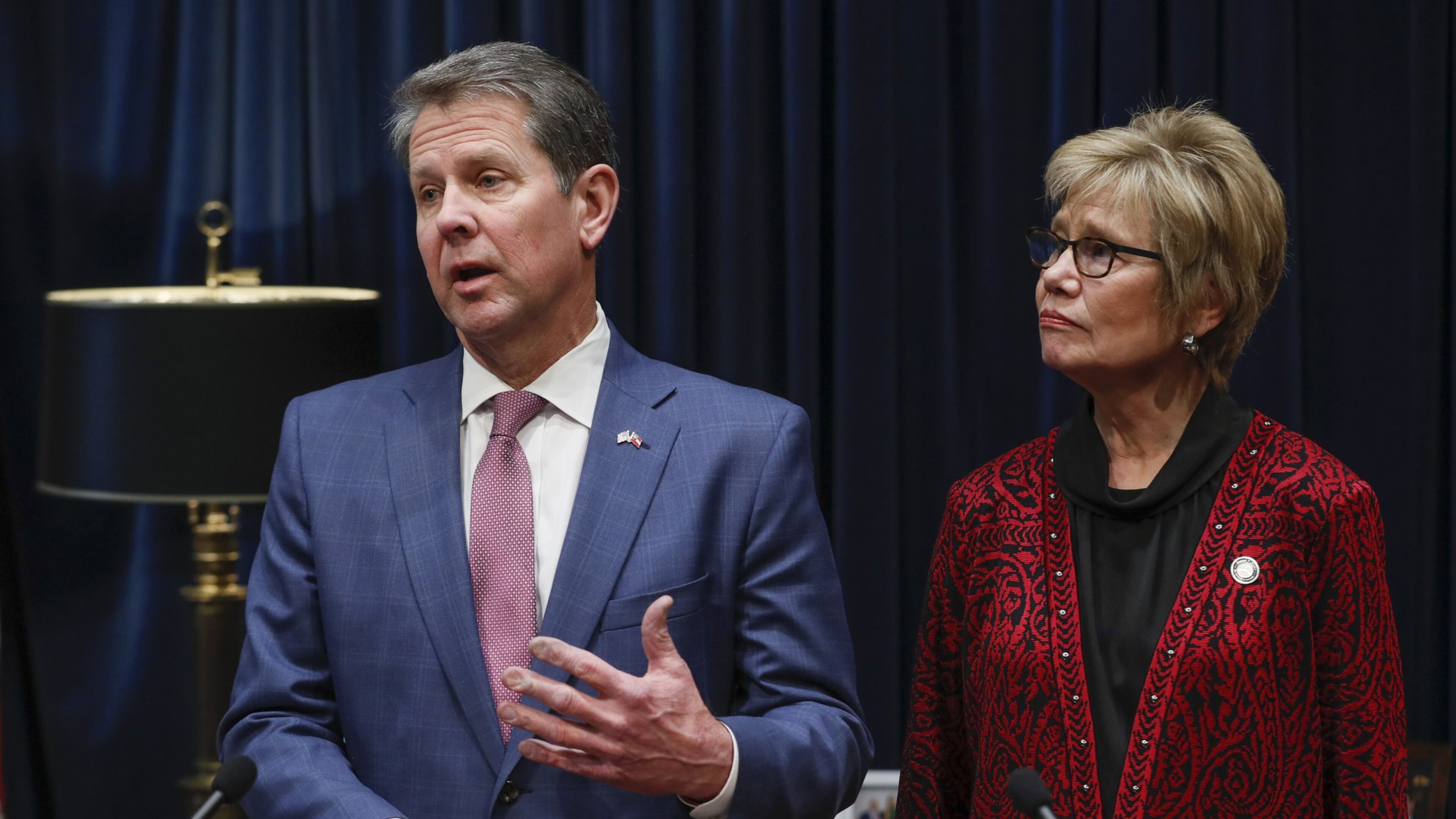 Governor Brian Kemp on Tuesday ordered the Georgia National Guard to assist senior care homes battle the coronavirus. His office said the missions will be in cooperatiion with the Georgia Department of Public Health, whose Commissioner, Dr. Kathleen Toomey, is seen here with the governor. Bob Andres / robert.andres@ajc.com