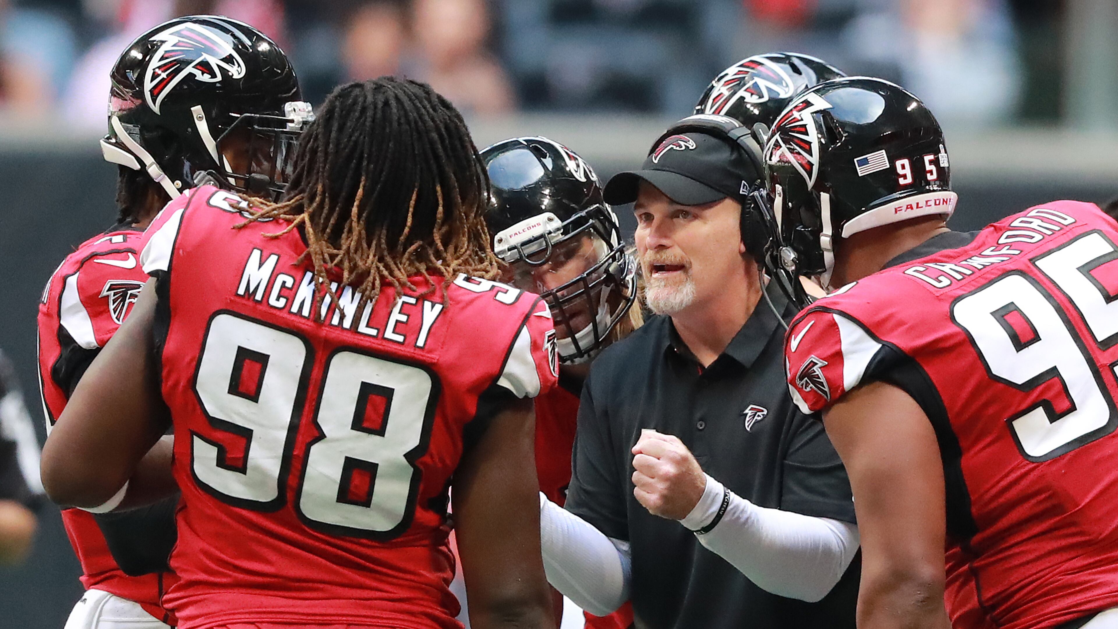 Falcons head coach Dan Quinn talks with his defense during a first half time out against the Tampa Bay Buccaneers Sunday, Oct 14, 2018, in Atlanta. The Falcons scored their second win of the season.