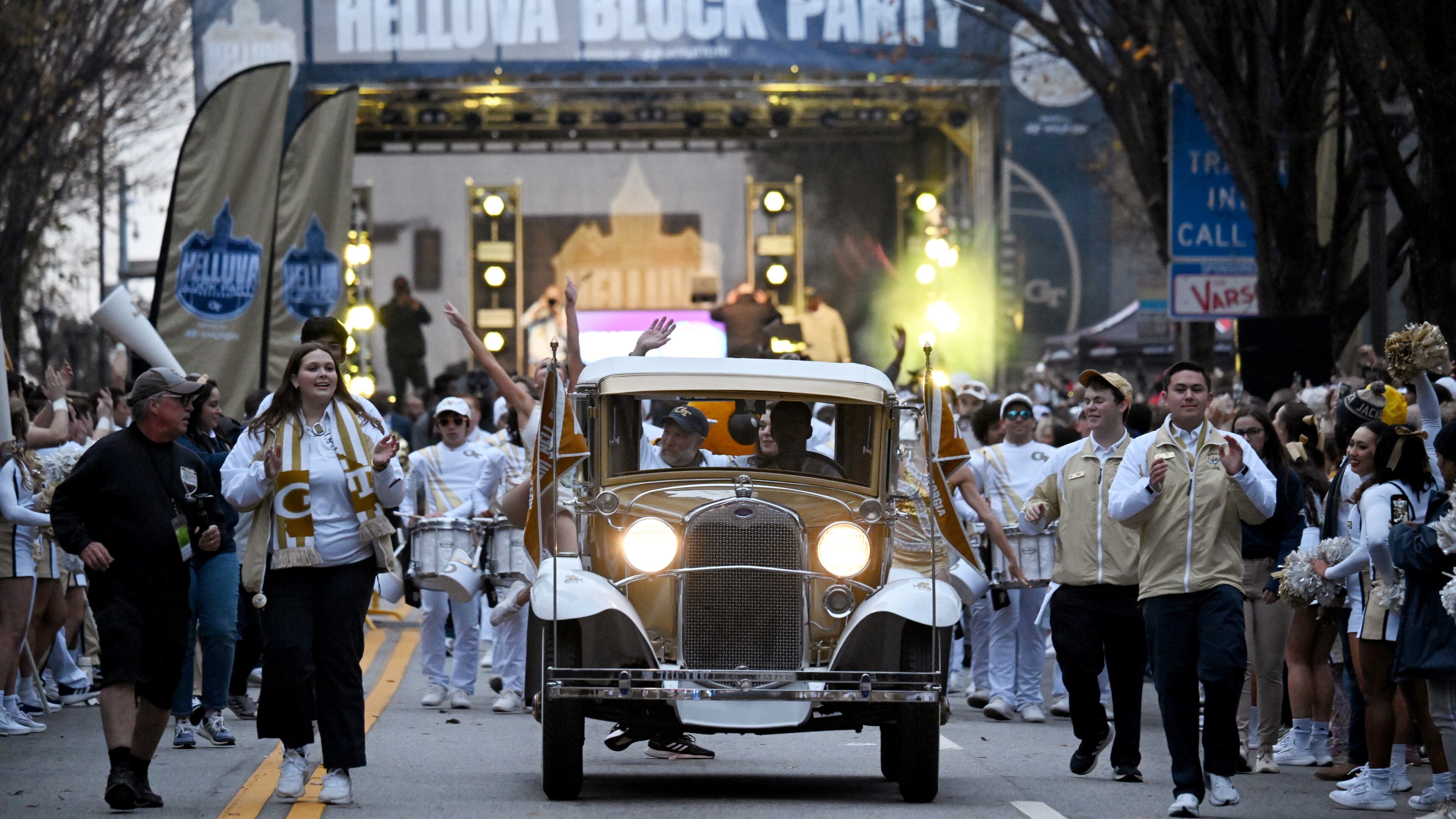 Georgia Tech's Ramblin' Wreck leads the band, cheerleaders, Buzz, players, and coaches before the start of the Georgia Tech against Georgia at Georgia Tech's Bobby Dodd Stadium, Saturday, November 25, 2023, in Atlanta. (Hyosub Shin / Hyosub.Shin@ajc.com)
