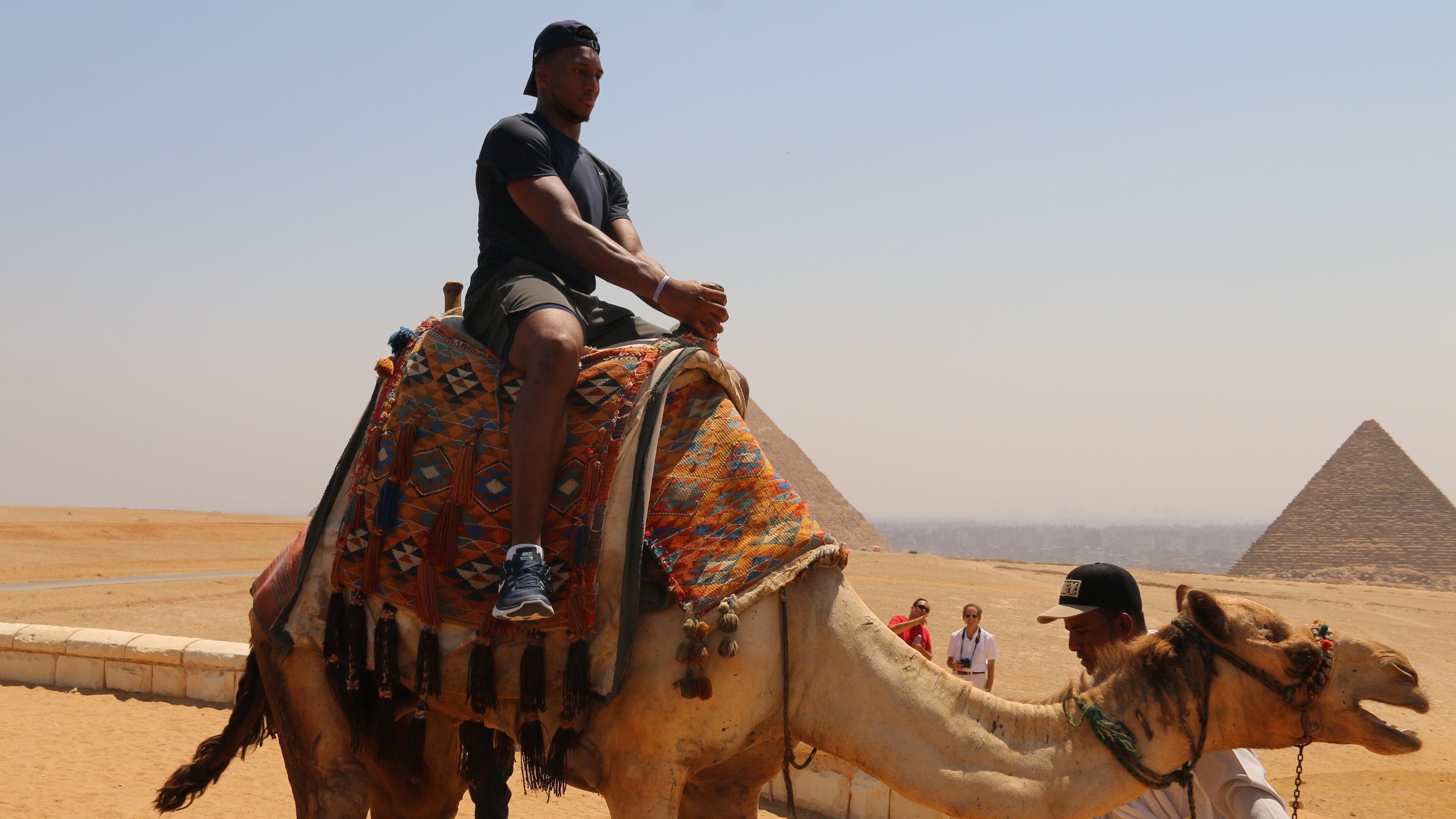 Josh Okogie's time in Egypt included a visit to the Pyramids of Giza and a moment in the saddle of a camel.