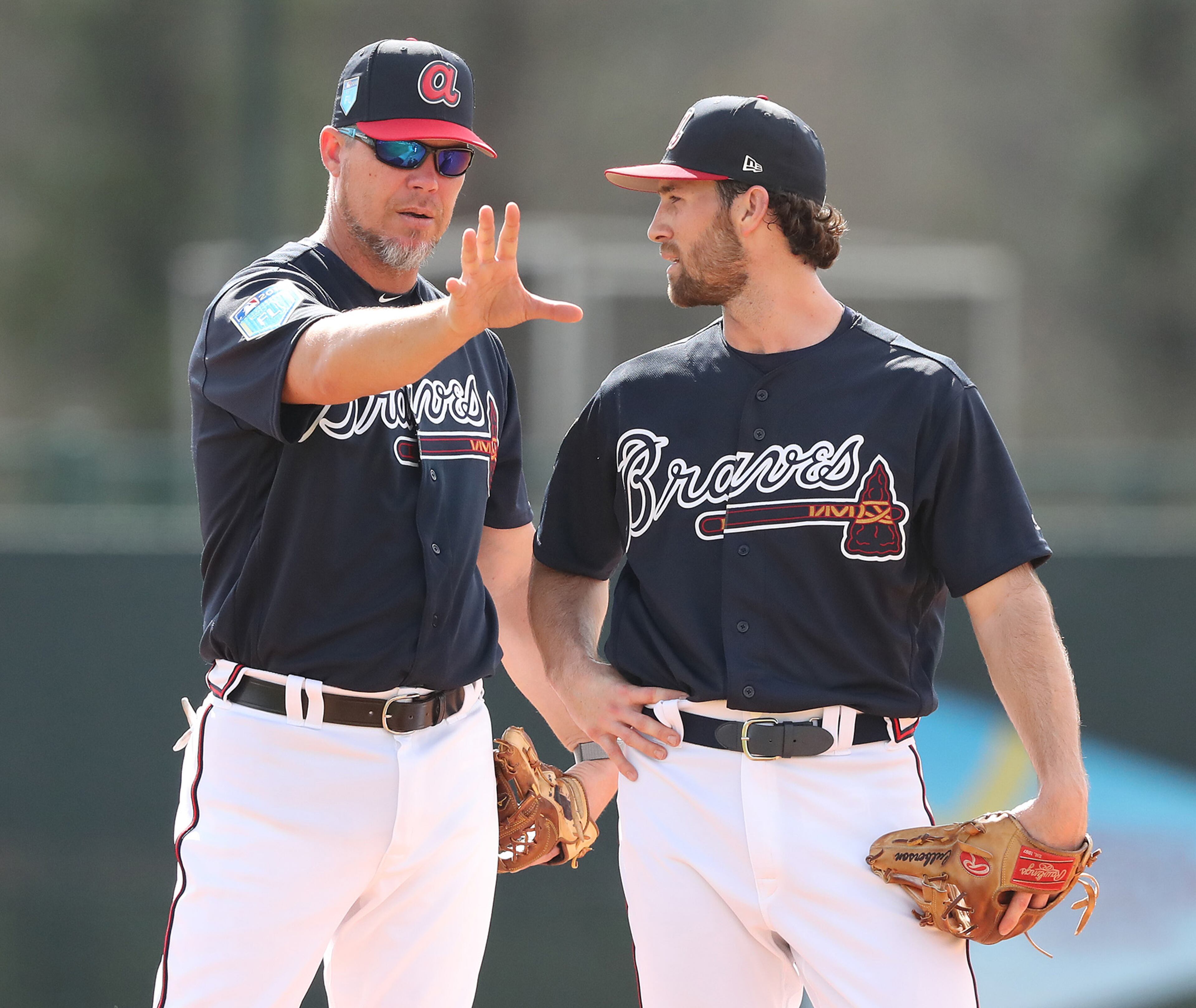 Feb 19, 2018 Lake Buena Vista: Braves recently elected Hall of Fame third baseman Chipper Jones works with infielder Charlie Culberson at spring training during the first full squad workout on Monday, Feb 19, 2018, at the ESPN Wide World of Sports Complex in Lake Buena Vista. Jones was helping coach the team for the day. Curtis Compton/ccompton@ajc.com