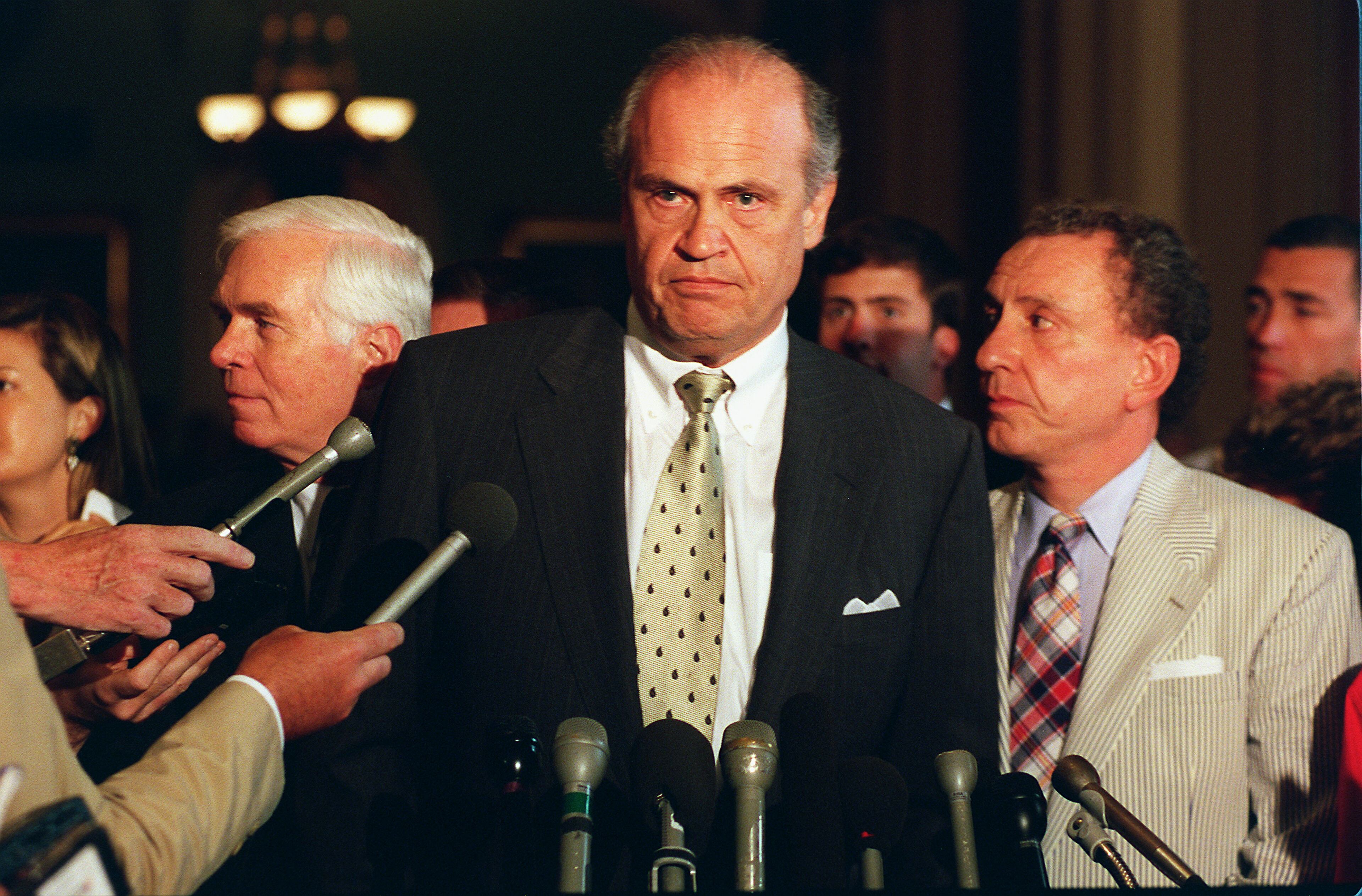 UNITED STATES - JULY 22: CAMPAIGN FINANCE HEARINGS--Senate Governmental Affairs Committee Chairman Fred Thompson, R-Tenn., Sens. Thad Cochran, R-Miss, left, and Arlen Specter, R-Pa., right, at news conference on witness immunity and the Justice Department. (Photo by Scott J. Ferrell/Congressional Quarterly/Getty Images)
