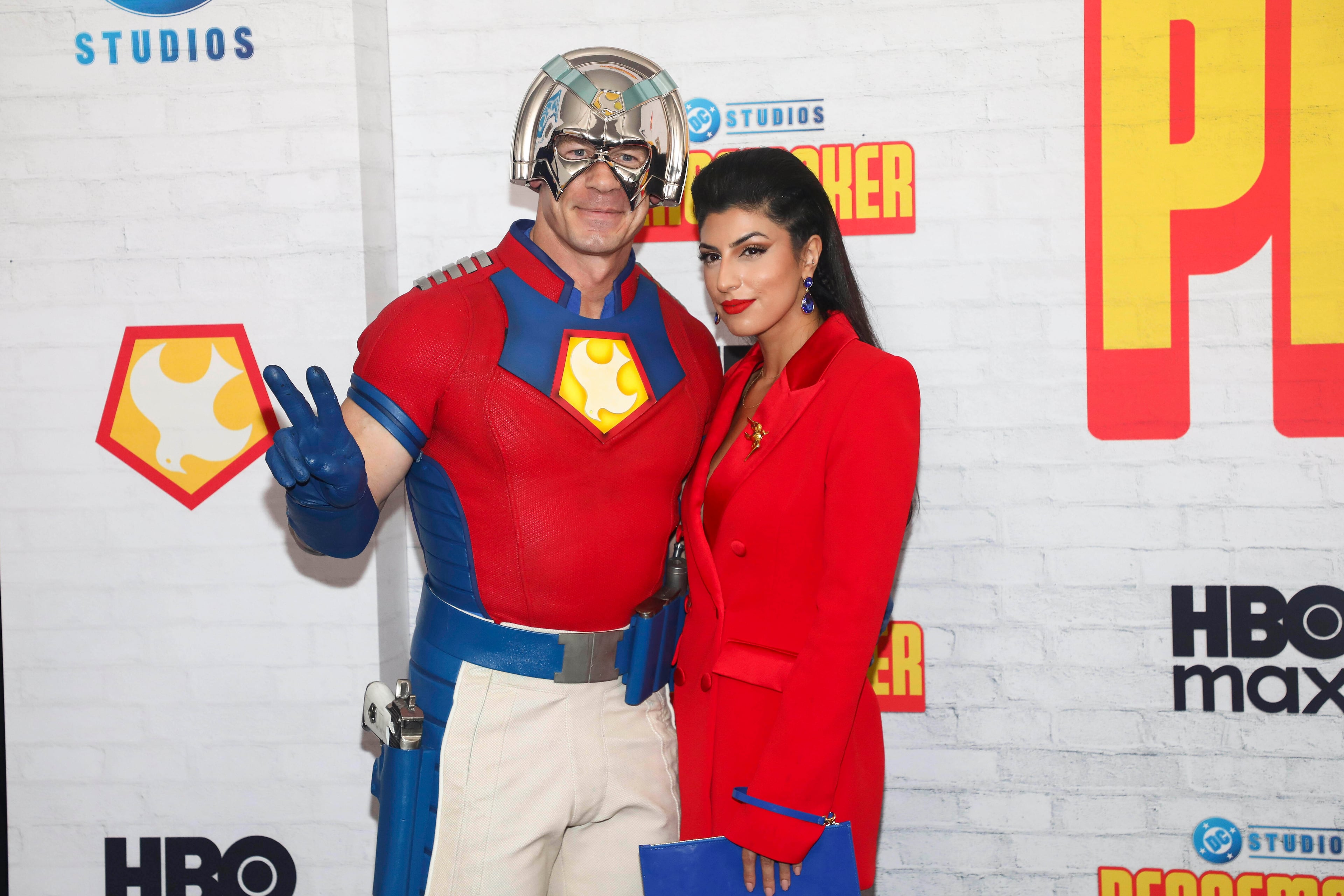 Actor John Cena (left) and his wife, Shay Shariatzadeh, attend the premiere of the “Peacemaker” at AMC Lincoln Square on Wednesday, Aug. 13, 2025, in New York. (Andy Kropa/Invision/AP)