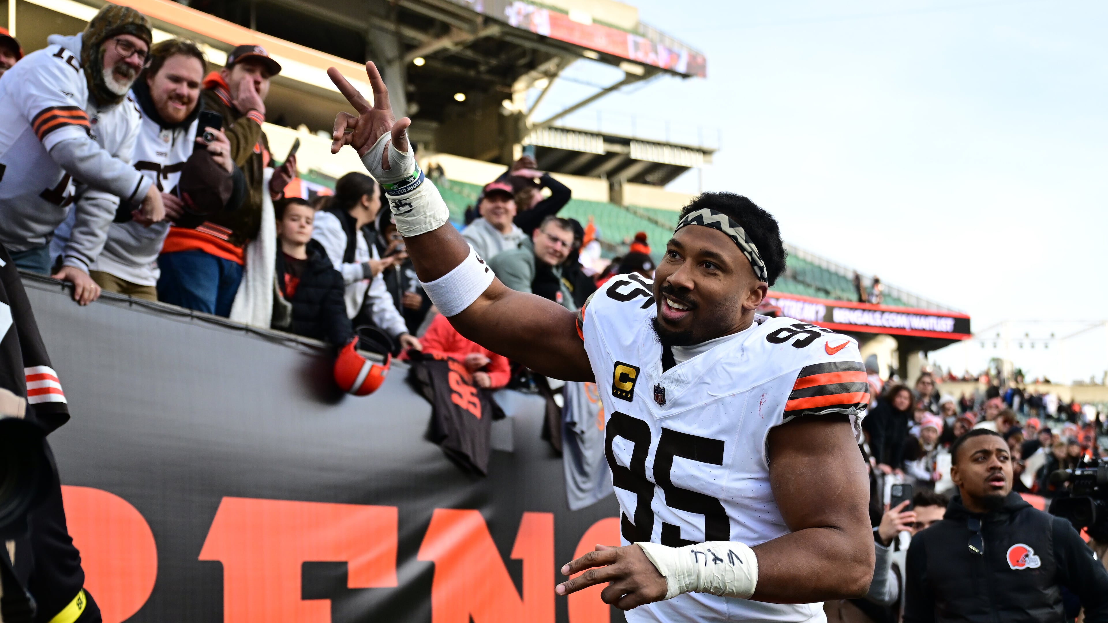 FILE - Cleveland Browns defensive end Myles Garrett celebrates with fans after an NFL football game against the Cincinnati Bengals in Cincinnati, Jan. 4, 2026. (AP Photo/David Dermer, File)