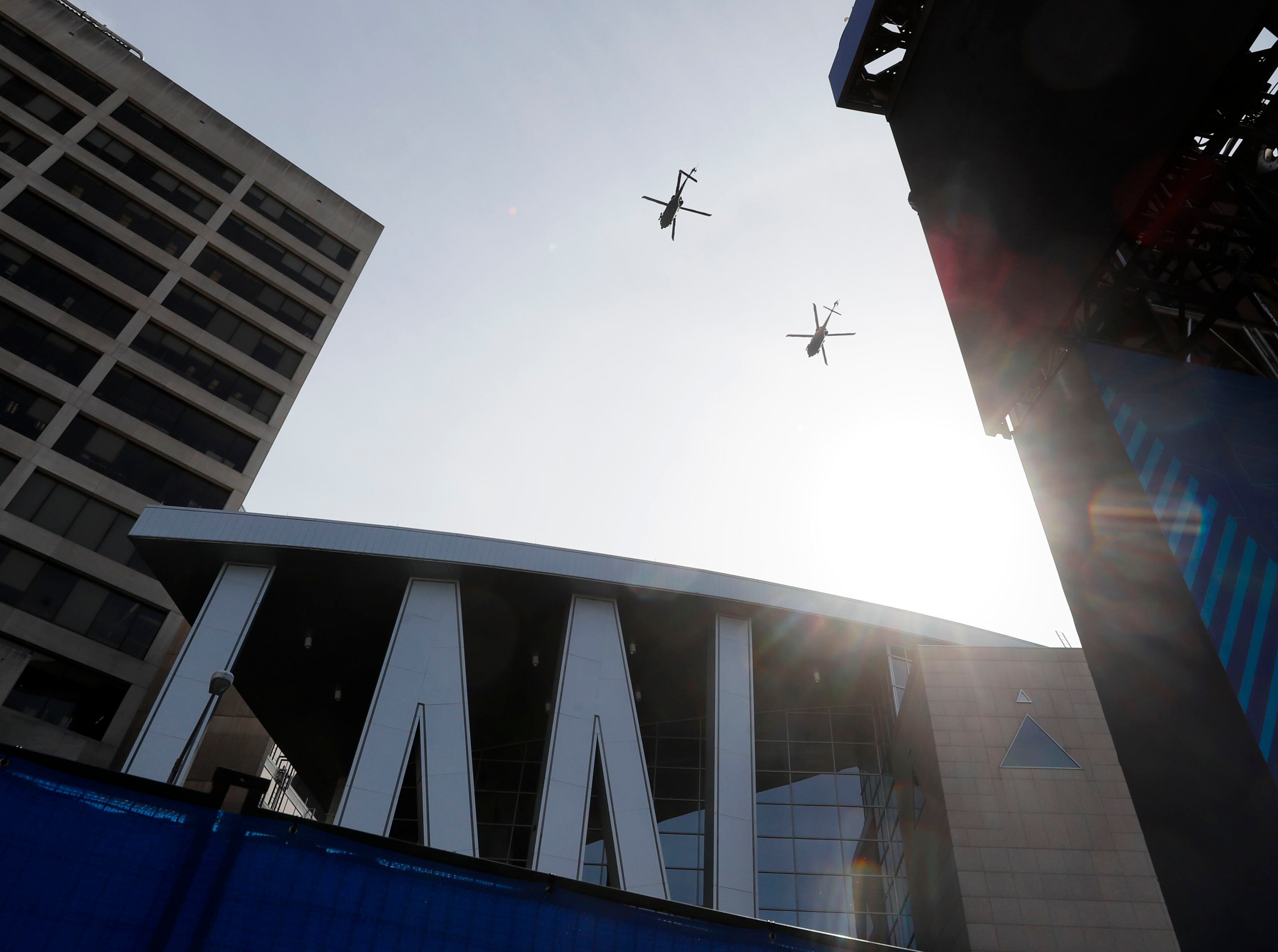 1/30/19 - Atlanta - Low flying helicopters over the GWCC. Security around the World Congress Center and Mercedes-Benz Stadium includes multiple layers with personnel from multiple agencies Bob Andres / bandres@ajc.com