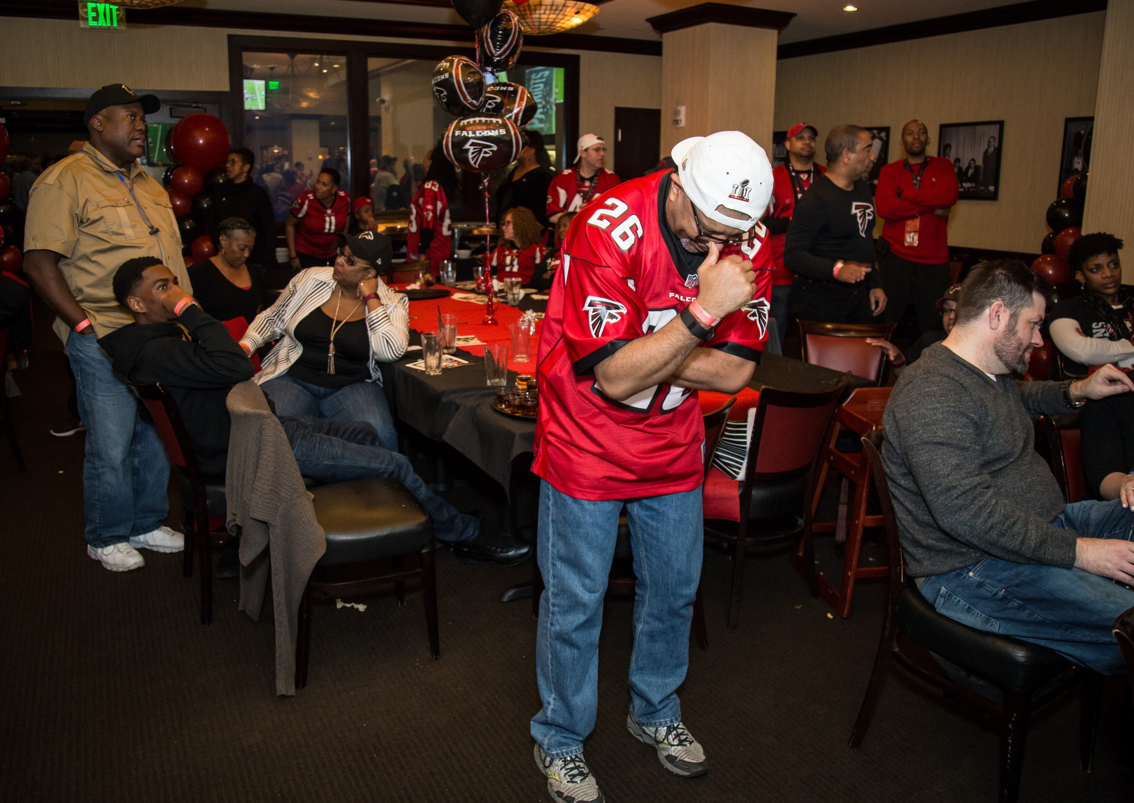 Falcons fans react after Atlanta lost the Super Bowl in overtime to the New England Patriots at Dantanna's Downtown In Atlanta Ga February 5, 2017. STEVE SCHAEFER / SPECIAL TO THE AJC