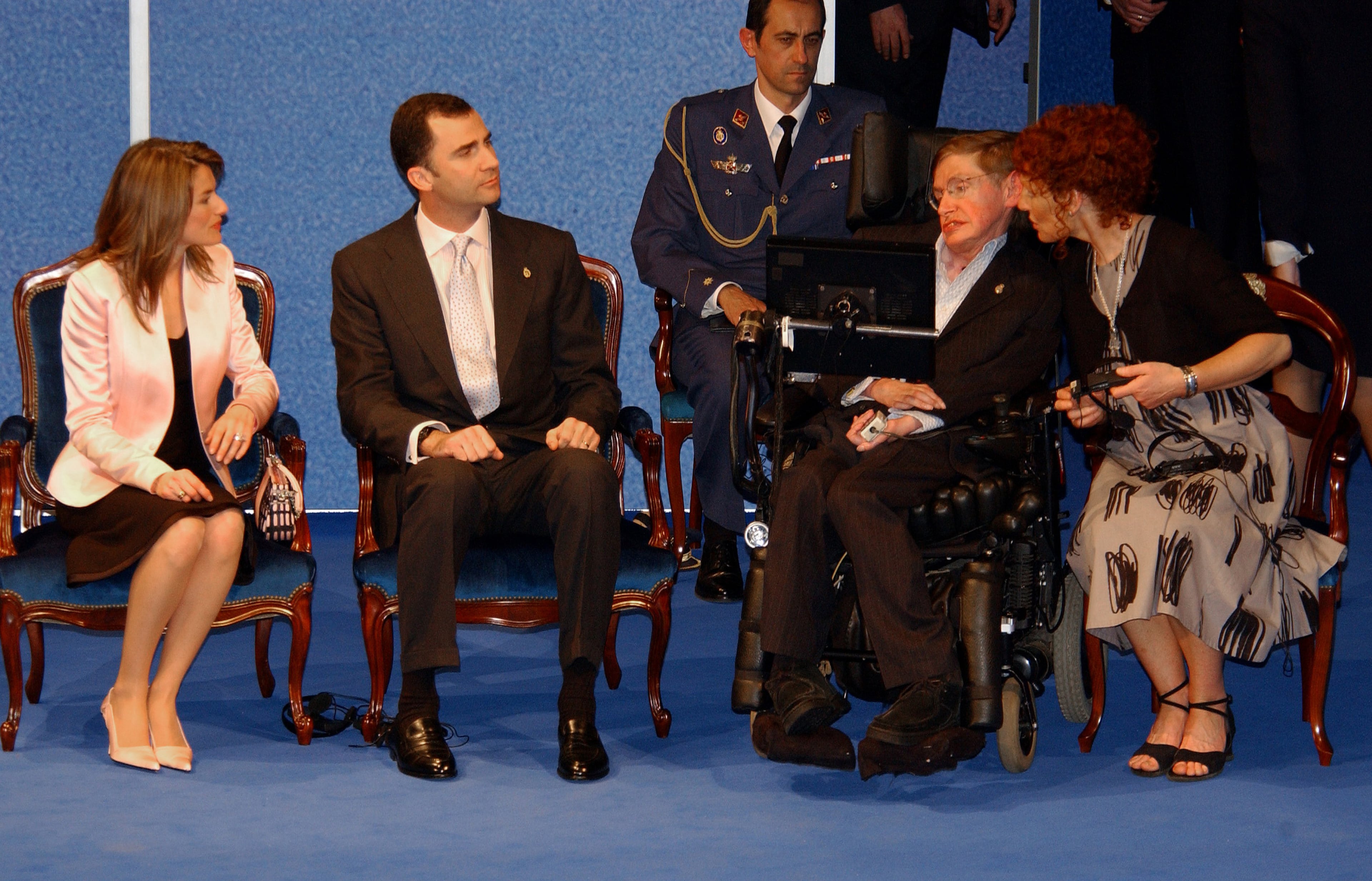 ASTURIAS, SPAIN - APRIL 12: Crown Prince Felipe (2nd-L) and Princes Letizia (L) attend Stephen Hawking's (2nd-R) conference at the "Prince of Asturias" Auditorium on April 12, 2005 in Oviedo, Asturias, Spain. (Photo by Carlos Alvarez/Getty Images)