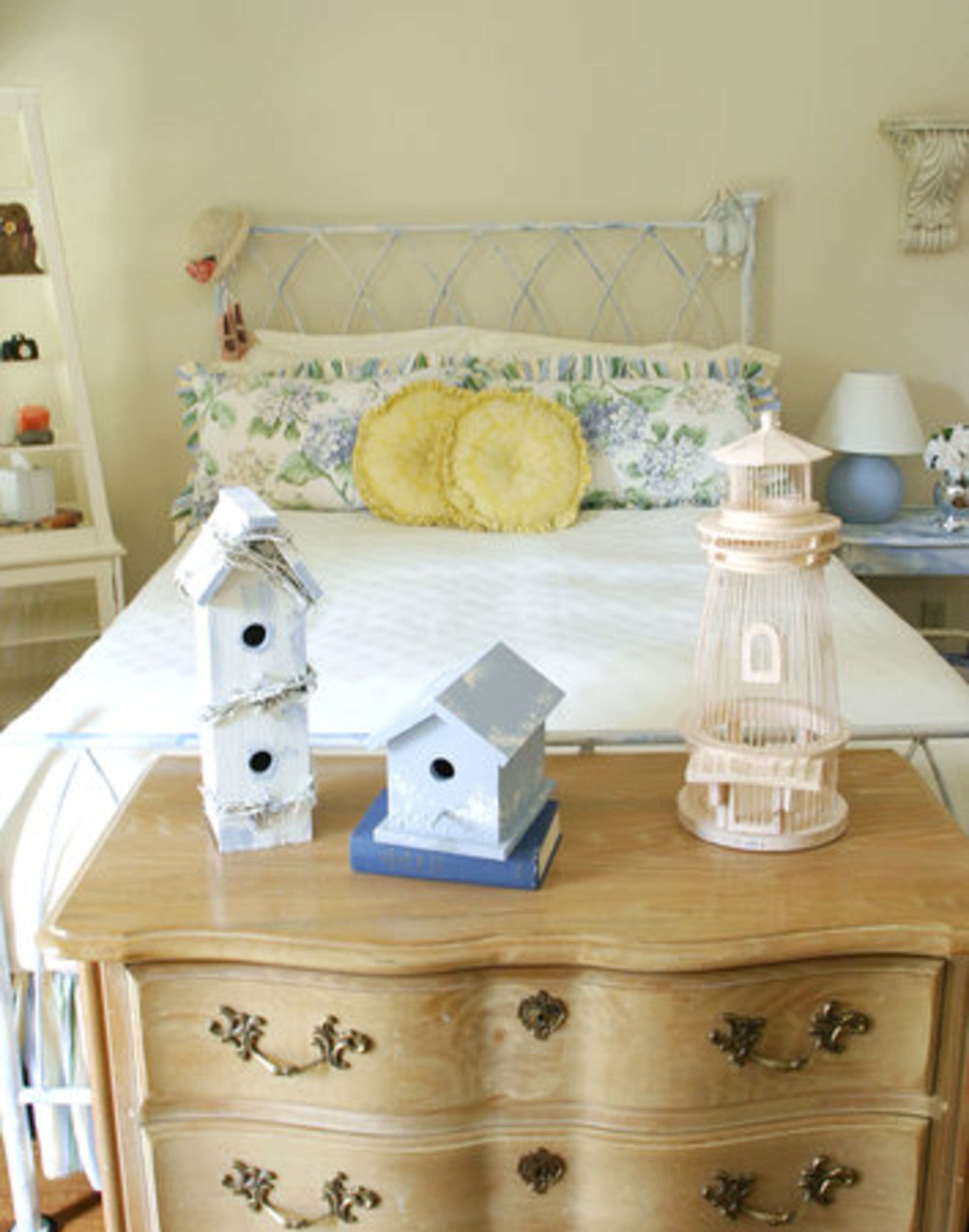 The guest room doubles as "our oldest daughter's room when she comes to visit," shares Lois. "My daughter (Dorian) chose most of that stuff with the designer, she loves the French country style."