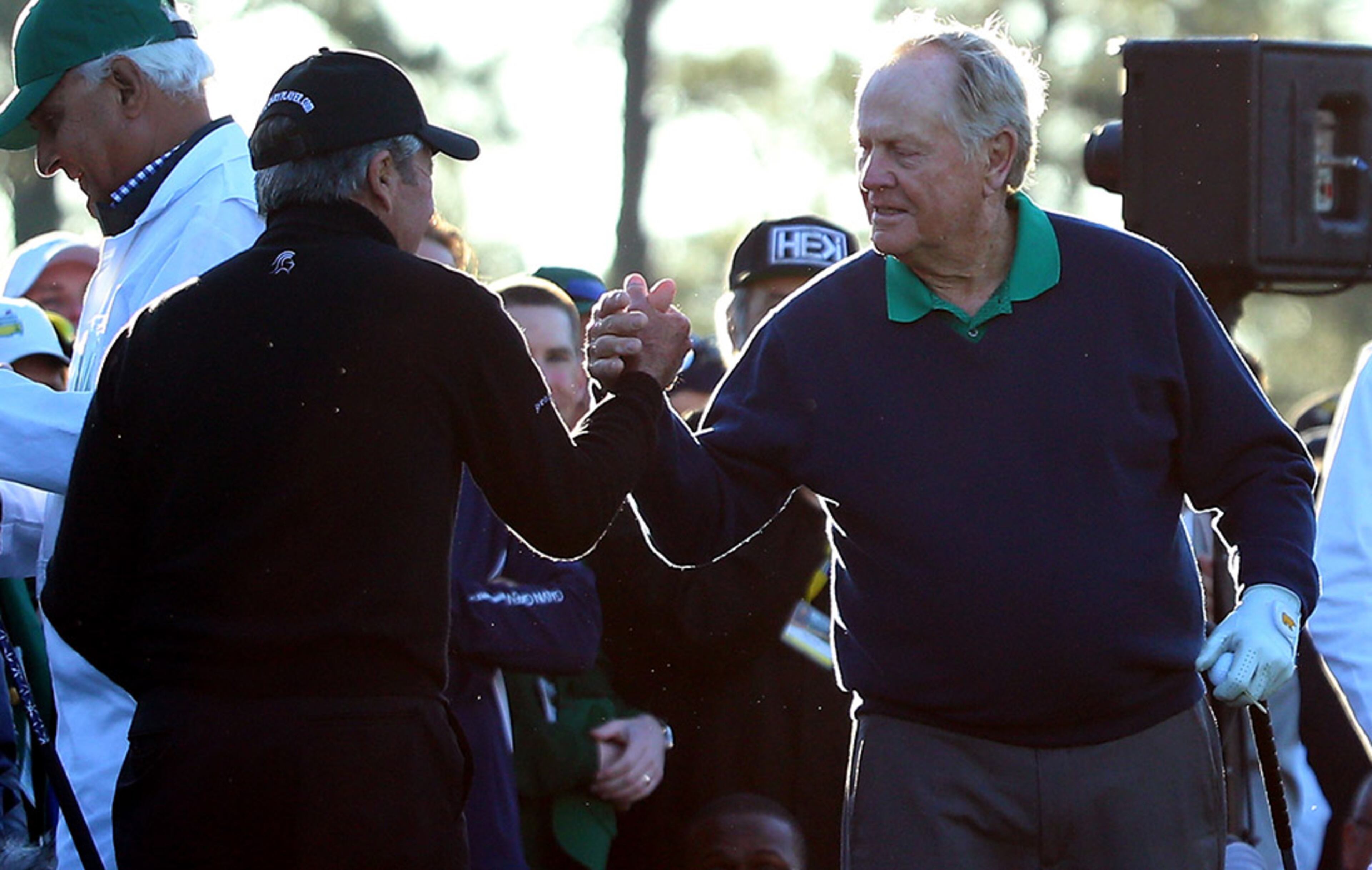 Honorary starters Gary Player (left) and Jack Nicklaus shake hands during the ceremonial tee off to start the first round of the 2016 Masters Tournament at Augusta National Golf Club on April 7, 2016 in Augusta.