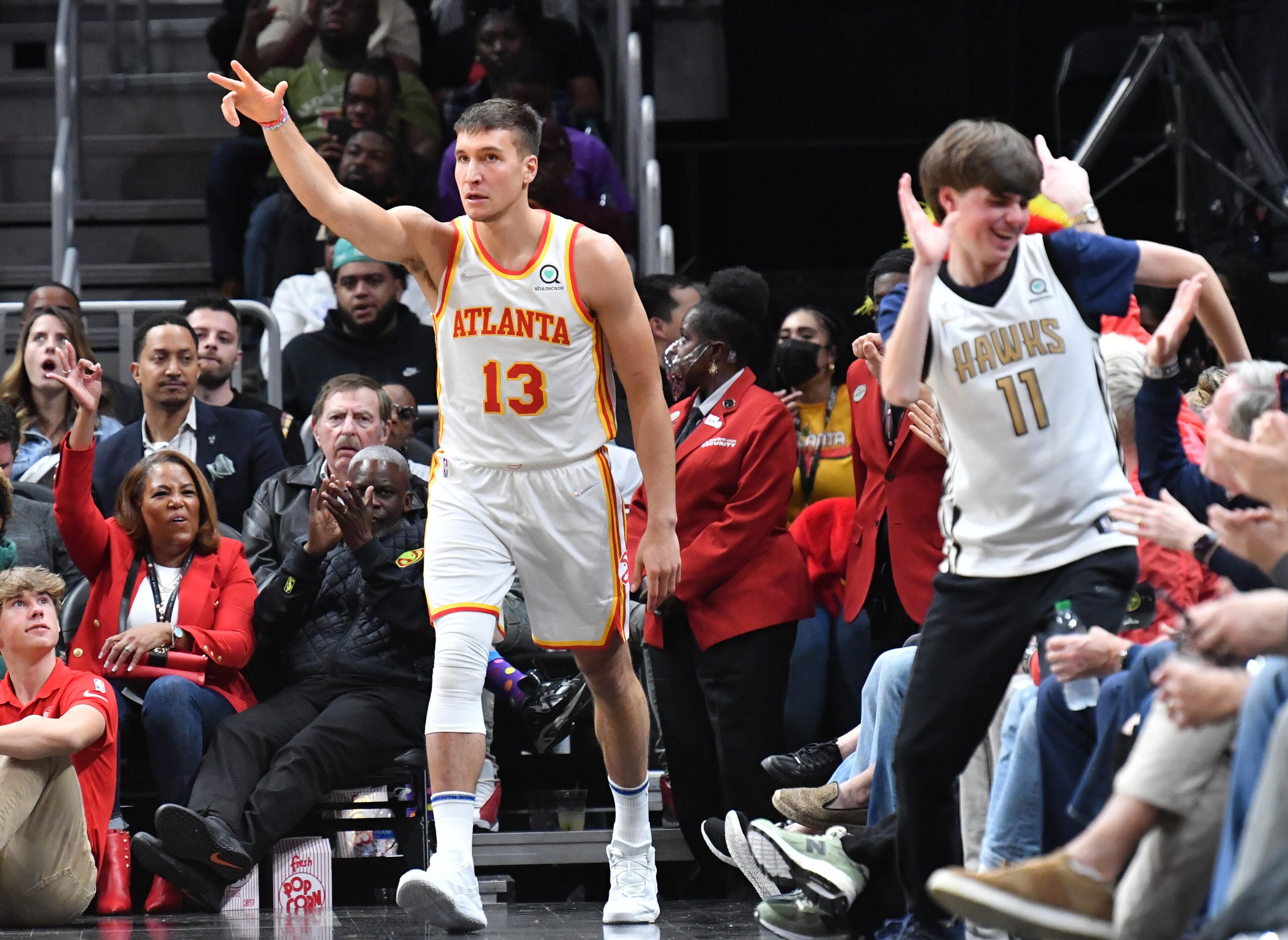 Atlanta Hawks' guard Bogdan Bogdanovic (13) reacts after scoring during the second half in an NBA basketball game at State Farm Arena on Thursday, March 31, 2022. Atlanta Hawks won 131-107 over Cleveland Cavaliers. (Hyosub Shin / Hyosub.Shin@ajc.com)