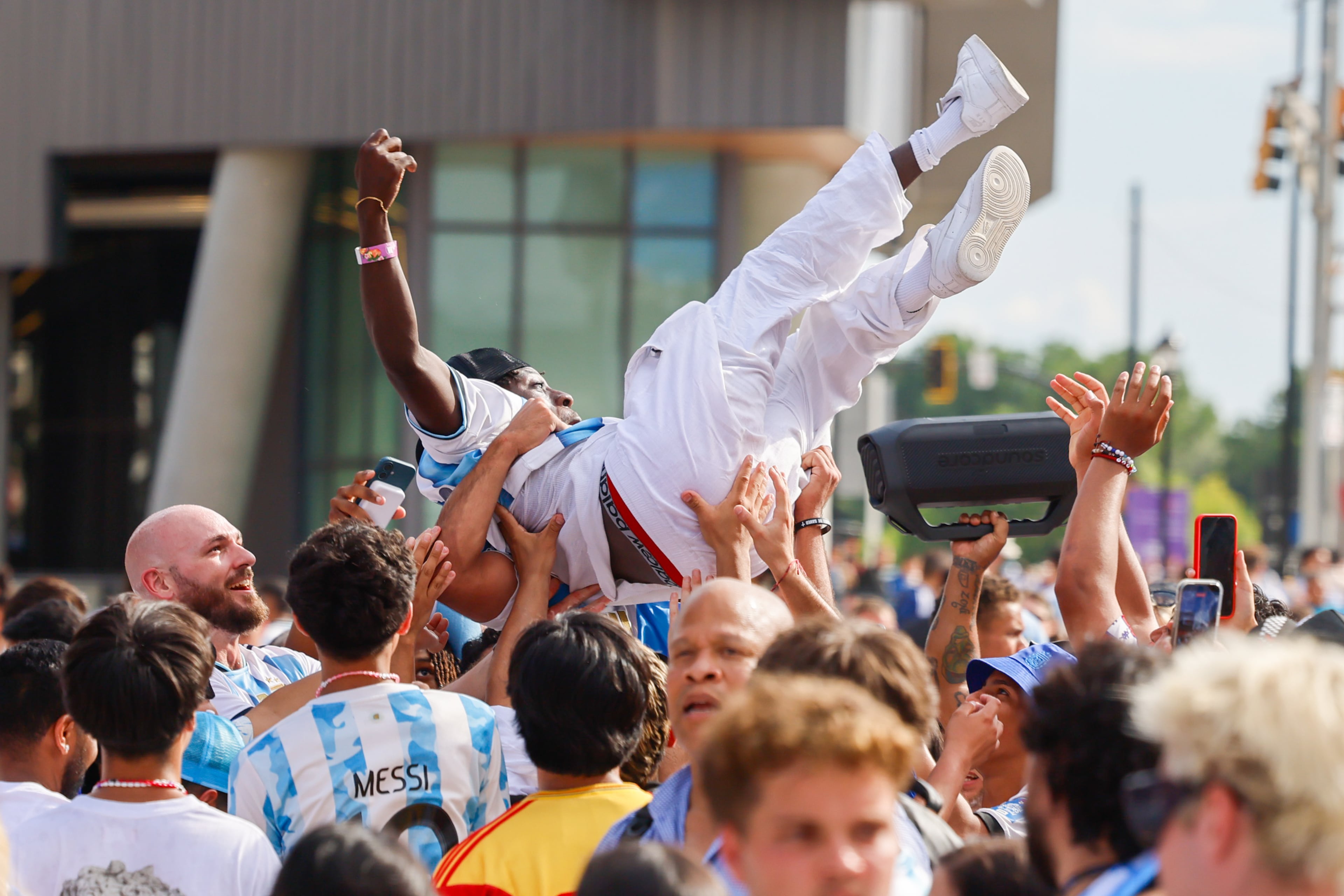 Argentina fans celebrate outside Atlanta Stadium (Mercedes-Benz Stadium) after Argentina wins the FIFA World Cup game between England and Argentina in Atlanta on July 15, 2026. It’s the last game Atlanta is hosting. Argentina won 2-1. (Arvin Temkar/AJC)