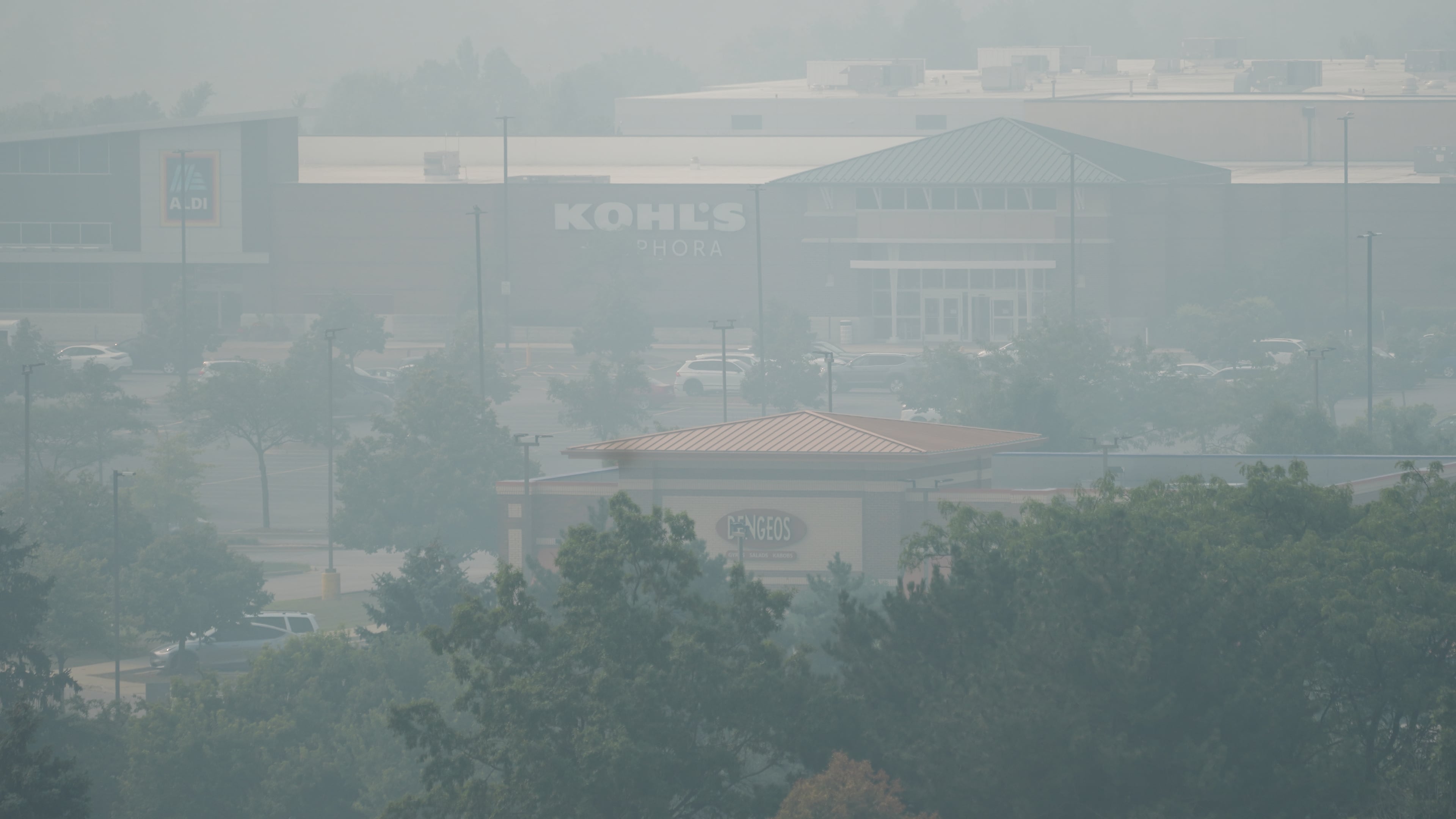 A general view of street mall during poor air quality due to dense smoke from Canadian wildfires in Glenview, Ill., Thursday, July 16, 2026. (AP Photo/Nam Y. Huh) CORRECTION: Glenview, not Northbrook