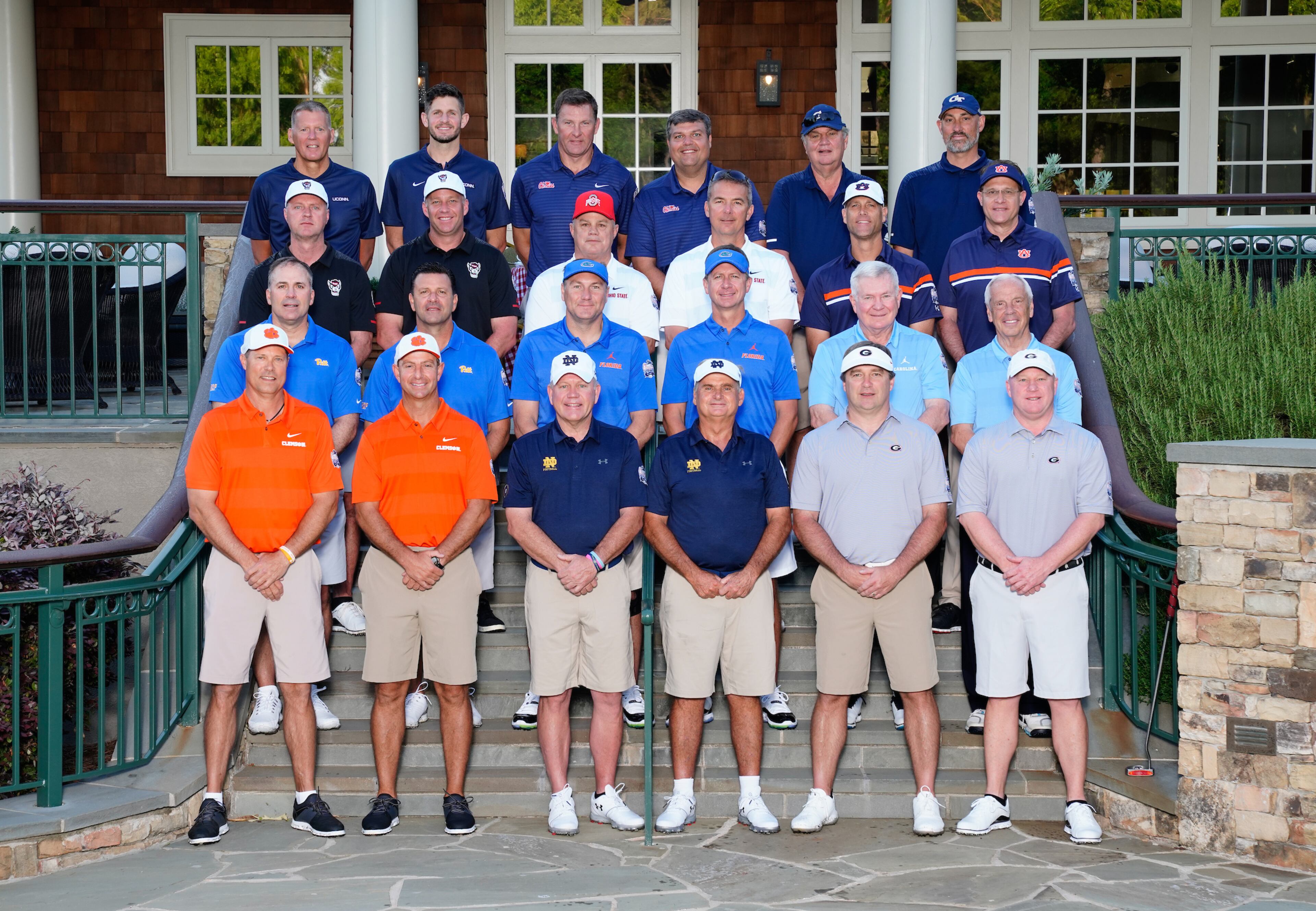 The coaches group prior to the Chick-fil-A Peach Bowl Challenge at the Ritz Carlton Reynolds, Lake Oconee, on Tuesday in Greensboro, GA. (Paul Abell via Abell Images for Chick-fil-A Peach Bowl Challenge)