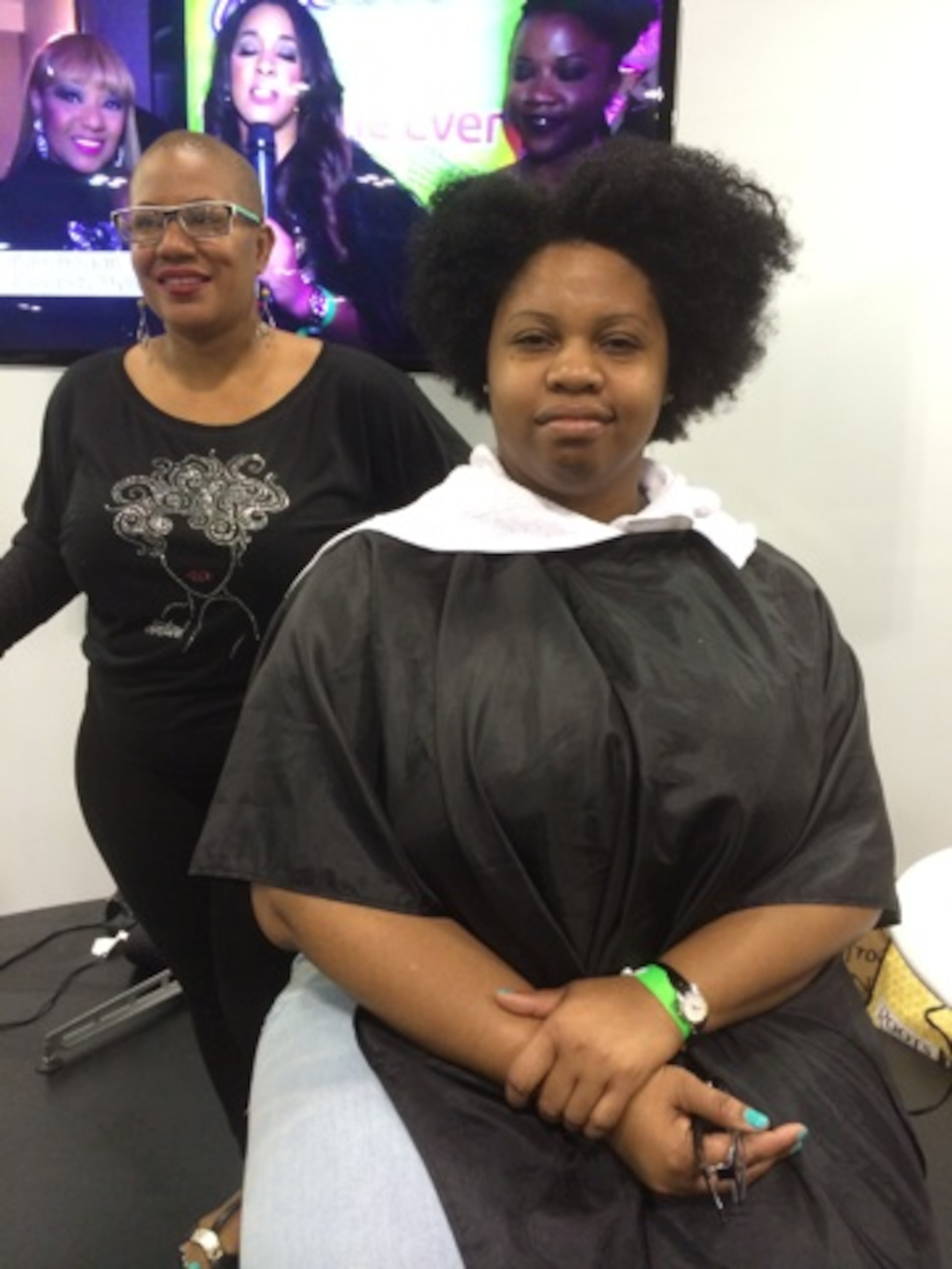 An attendee gets a hair makeover (before).