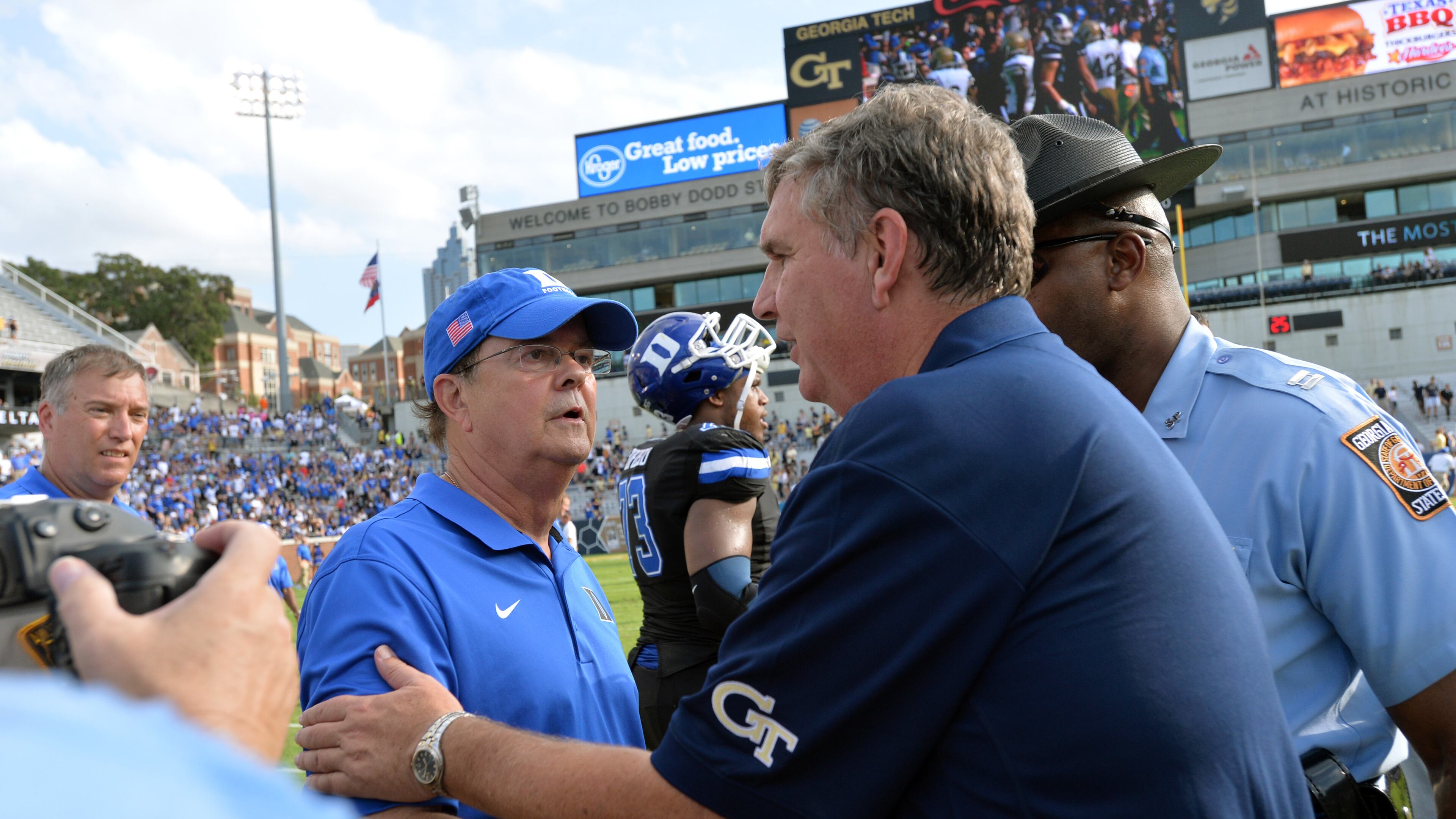 October 11, 2014 Atlanta - Georgia Tech Yellow Jackets head coach Paul Johnson (right) shakes hands with Duke Blue Devils head coach David Cutcliffe after losing to the Duke Blue Devils at Bobby Dodd Stadium on Saturday, October 11, 2014. HYOSUB SHIN / HSHIN@AJC.COM