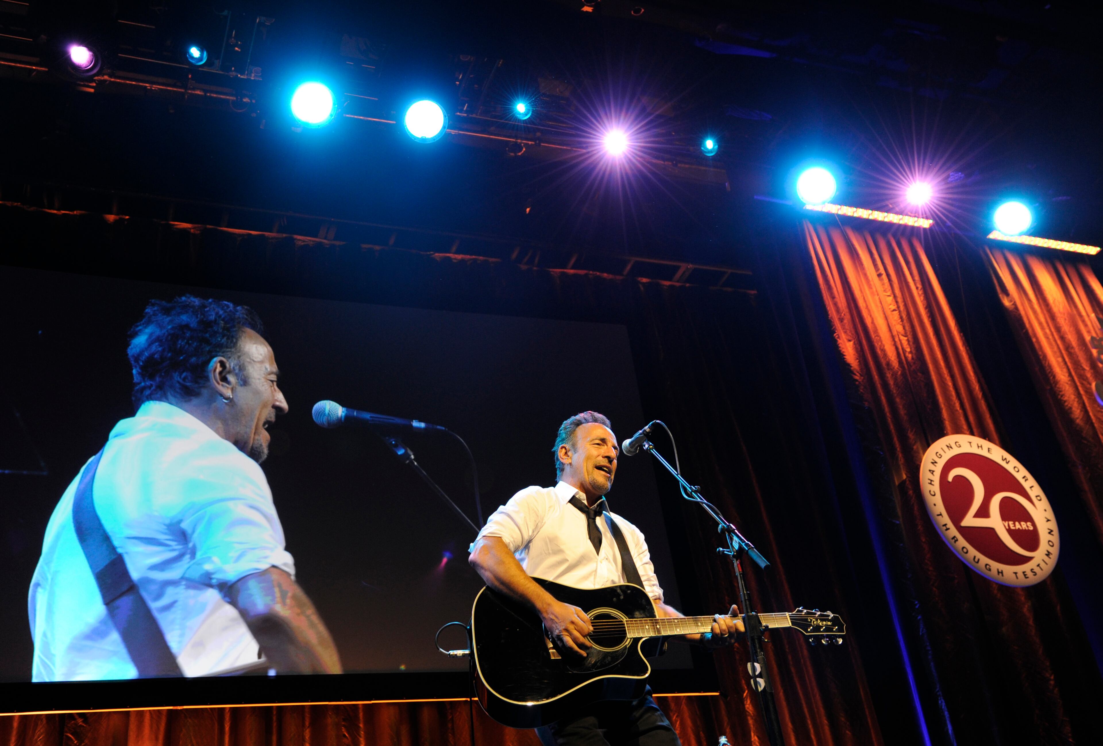 Bruce Springsteen performs during the USC Shoah Foundation's 20th anniversary Ambassadors for Humanity gala in Los Angeles, Wednesday, May 7, 2014. (AP Photo/Susan Walsh)