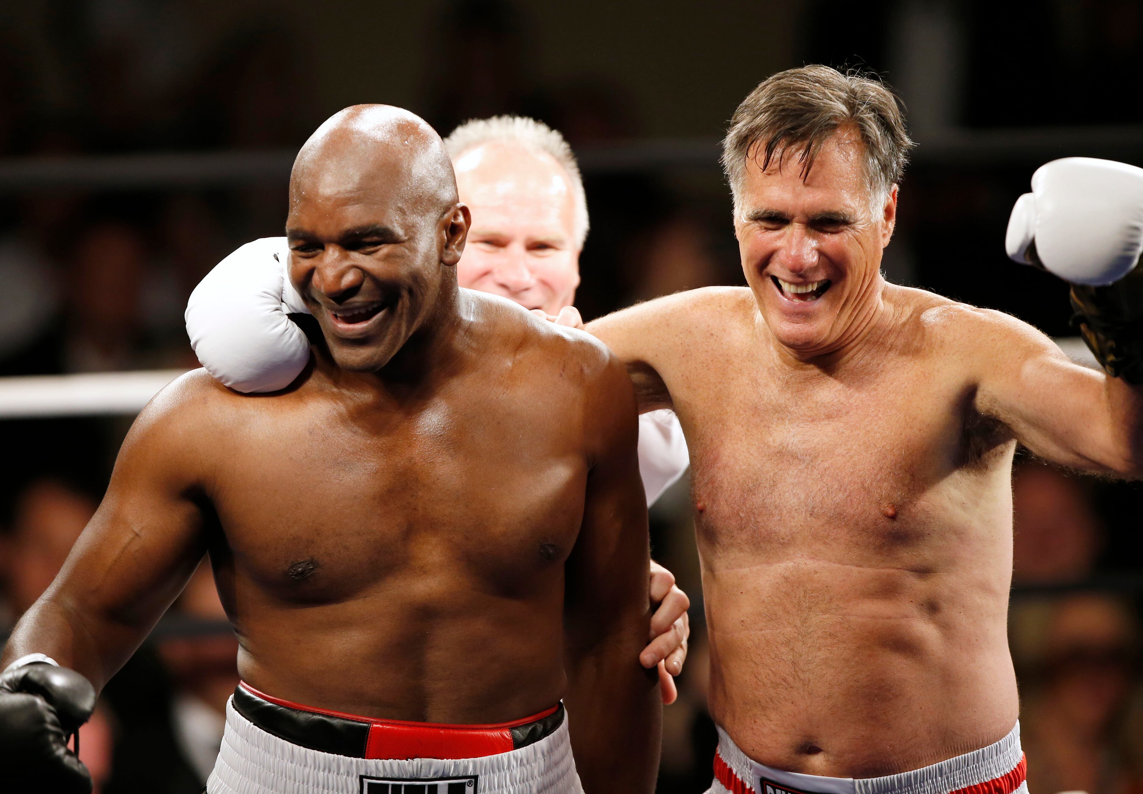 SALT LAKE CITY, UT - MAY 15: Evander Holyfield celebrates his win over Mitt Romney during a charity boxing event on May 15, 2015 in Salt Lake City, Utah. The event was held to raise money for "Charity Vision" a charity that aims to restore sight to the blind and visually impaired. (Photo by George Frey/Getty Images)