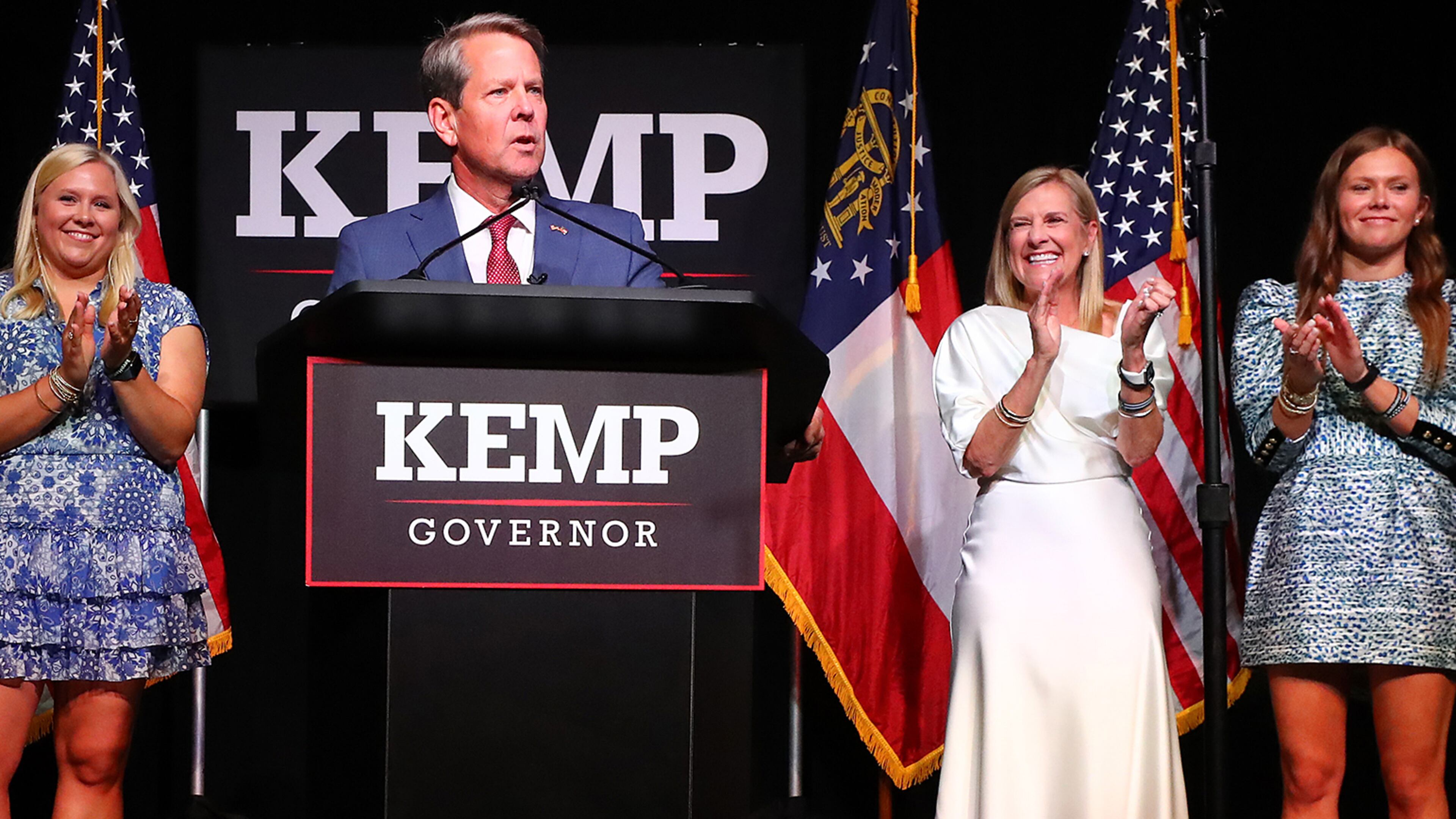 Governor Brian Kemp delivers his election night party speech backed by his wife and children (from left) Lucy, Jarrett, First Lady Marty Kemp, and Amy at the College Football Hall of Fame on Tuesday, May 24, 2022, in Atlanta. Curtis Compton / Curtis.Compton@ajc.com