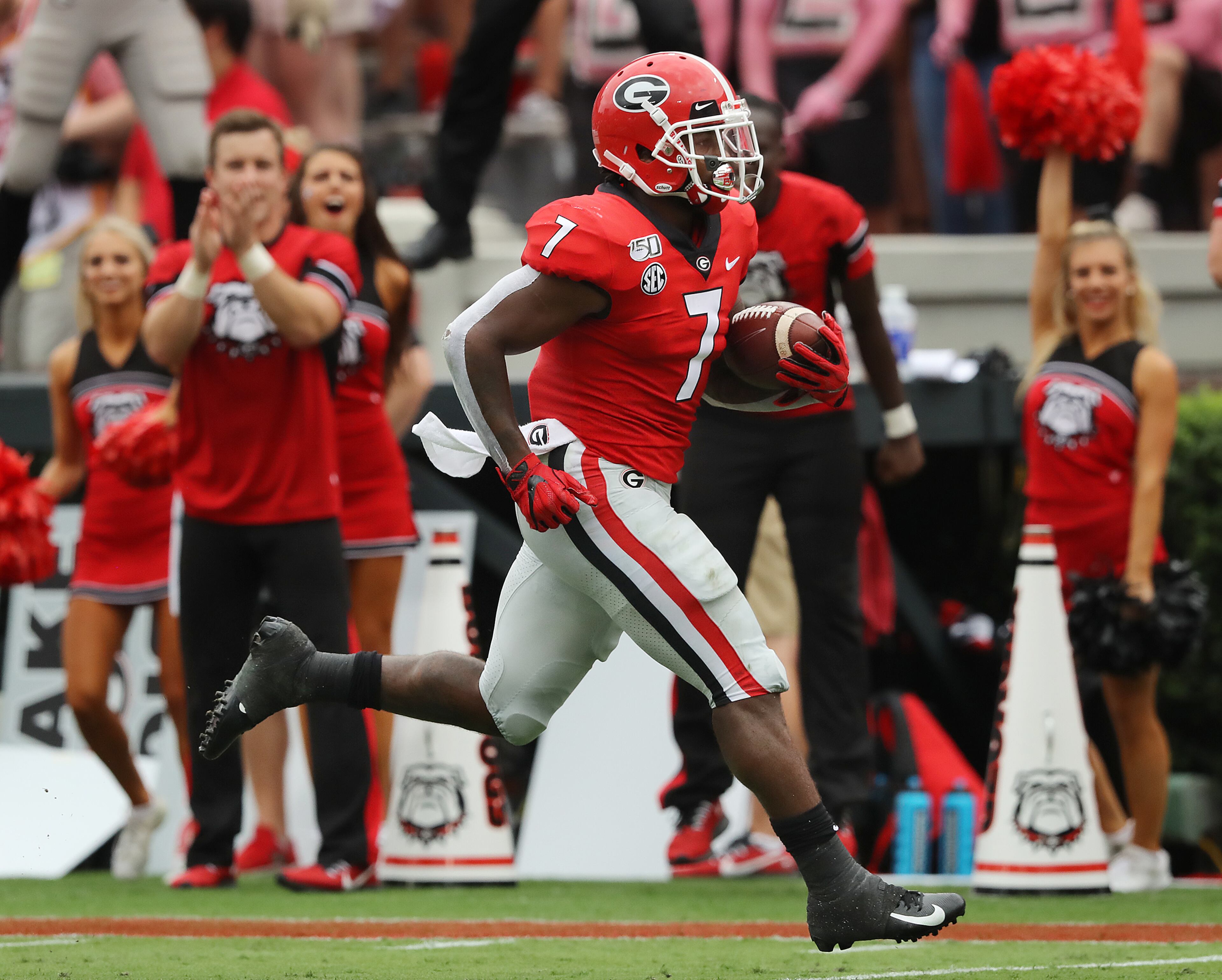 Georgia tailback D'Andre Swift breaks away from Arkansas State for a long touchdown run to take a 27-0 lead. Curtis Compton/ccompton@ajc.com