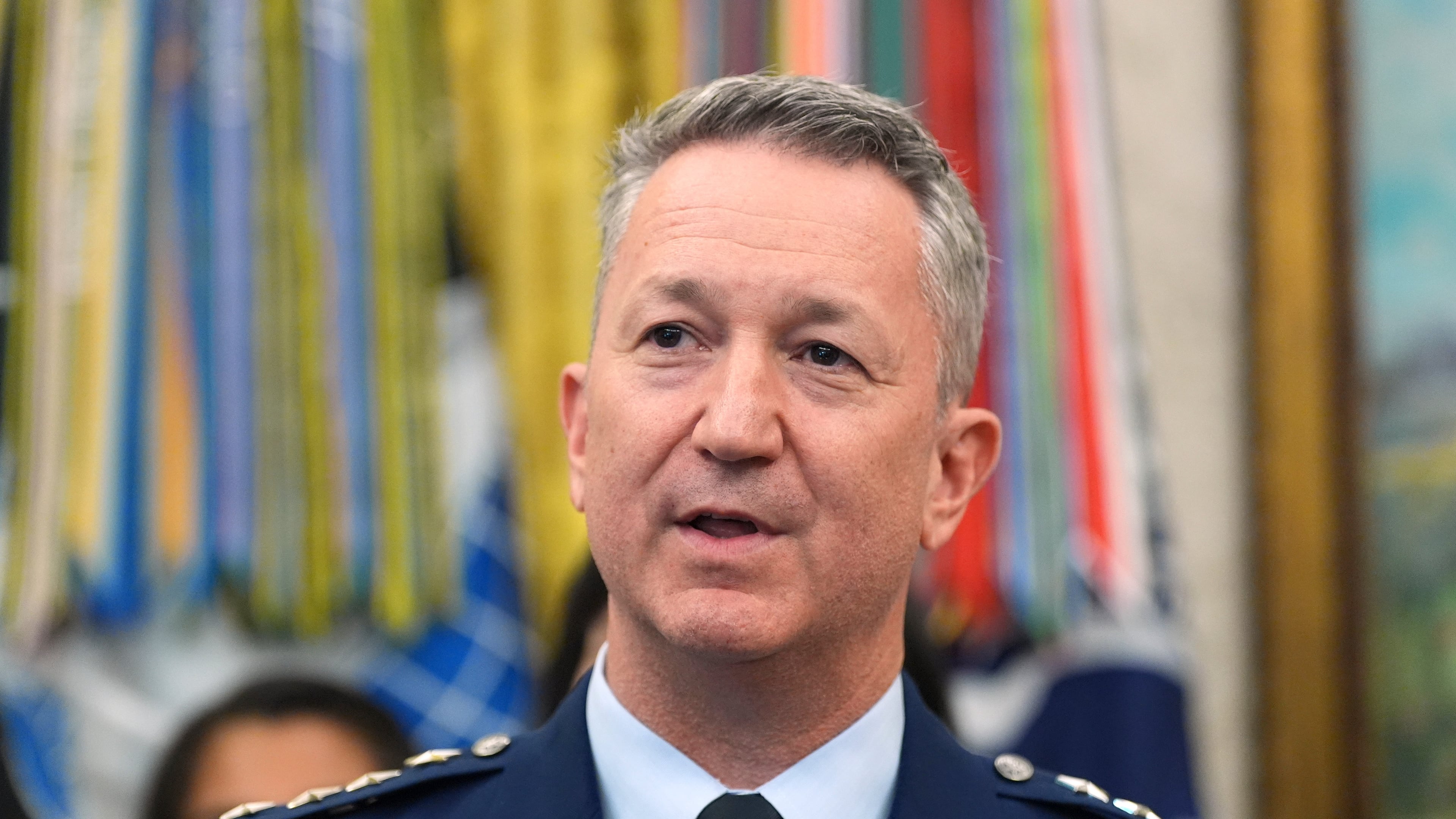 Gen. Dan Caine, chairman of the Joint Chiefs of Staff, speaks during a meeting about military families with President Donald Trump, in the Oval Office of the White House, Monday, Aug. 3, 2026, in Washington. (AP Photo/Alex Brandon)