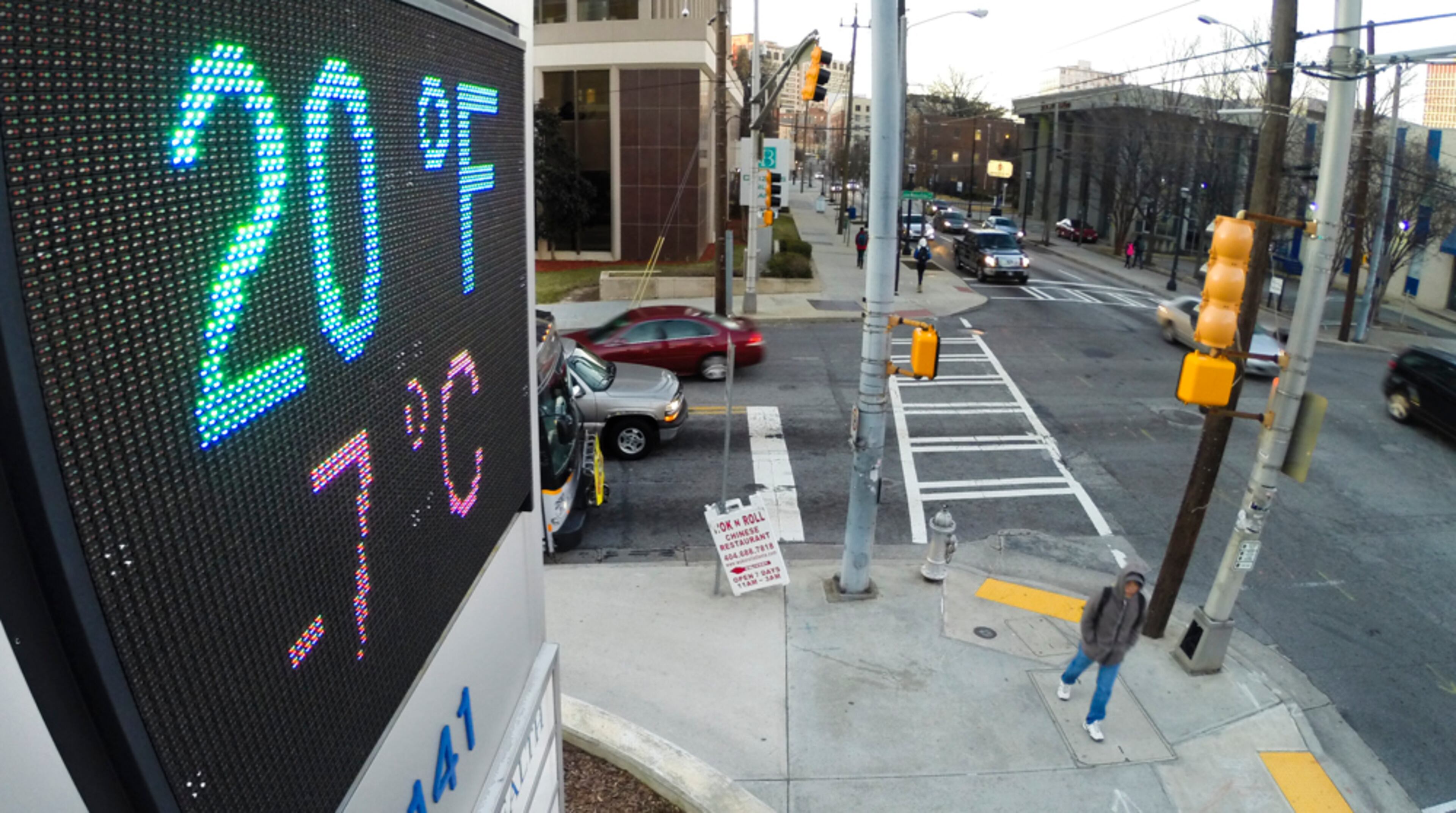 ATLANTA TEMPERATURE DROP--Jan. 22, 2014 Atlanta : The sign at 141 Piedmont Avenue at Georgia State University displays the temperature at 7:45 am. The Arctic blast that pushed a few snow flurries through metro Atlanta Tuesday afternoon sent temperatures plummeting into the teens early Wednesday, Jan. 22, 2014 and forecasters said the bitter cold will last through the end of the week. Channel 2 meteorologist Karen Minton said temperatures will be slow to rebound from the latest round of polar air, not climbing into the 40s until Saturday. Minton predicted upper 30s Thursday and mid-30s Friday, with lows in the low 20s early Thursday and mid-teens Friday morning. Check today's full weather report and track changes. The weekend should be sunny and warmer, Minton said, with highs around 47 Saturday and 50 Sunday. Weekend lows will be in the low 20s early Saturday and mid-20s Sunday, Minton said. Atlanta's official low early Wednesday of 16 degrees was 18 degrees below normal but 6 degrees above the record low for the date of 10, set in 1961. By comparison, the temperature early Wednesday in Fairbanks, Alaska, was 29, and the temperature in Anchorage was 34. JOHN SPINK/JSPINK@AJC.COM