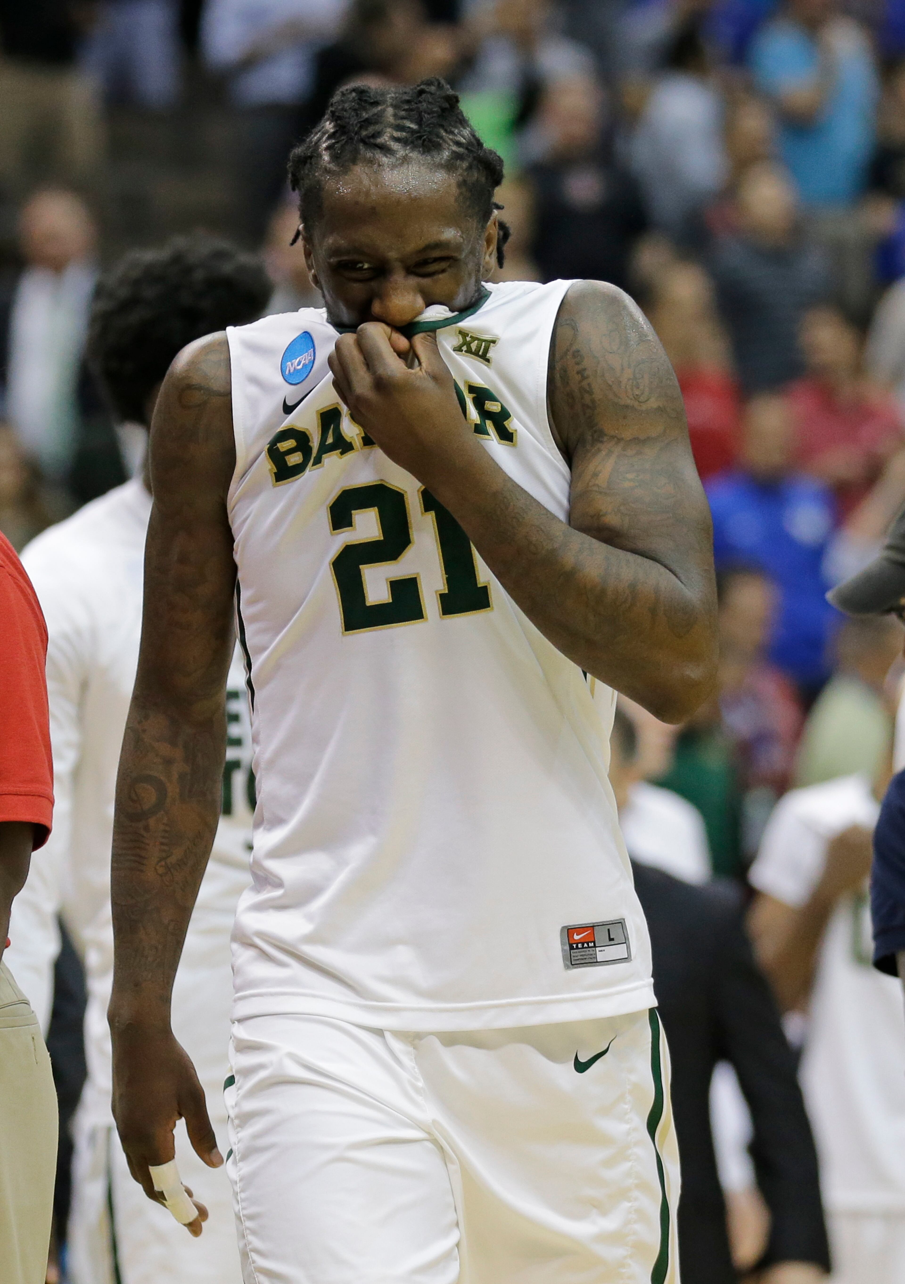 Baylor's Taurean Prince (21) leaves the court after losing to Georgia State in an NCAA tournament second round college basketball game, Thursday, March 19, 2015, in Jacksonville, Fla. Georgia State won 57-56. (AP Photo/Chris O'Meara)