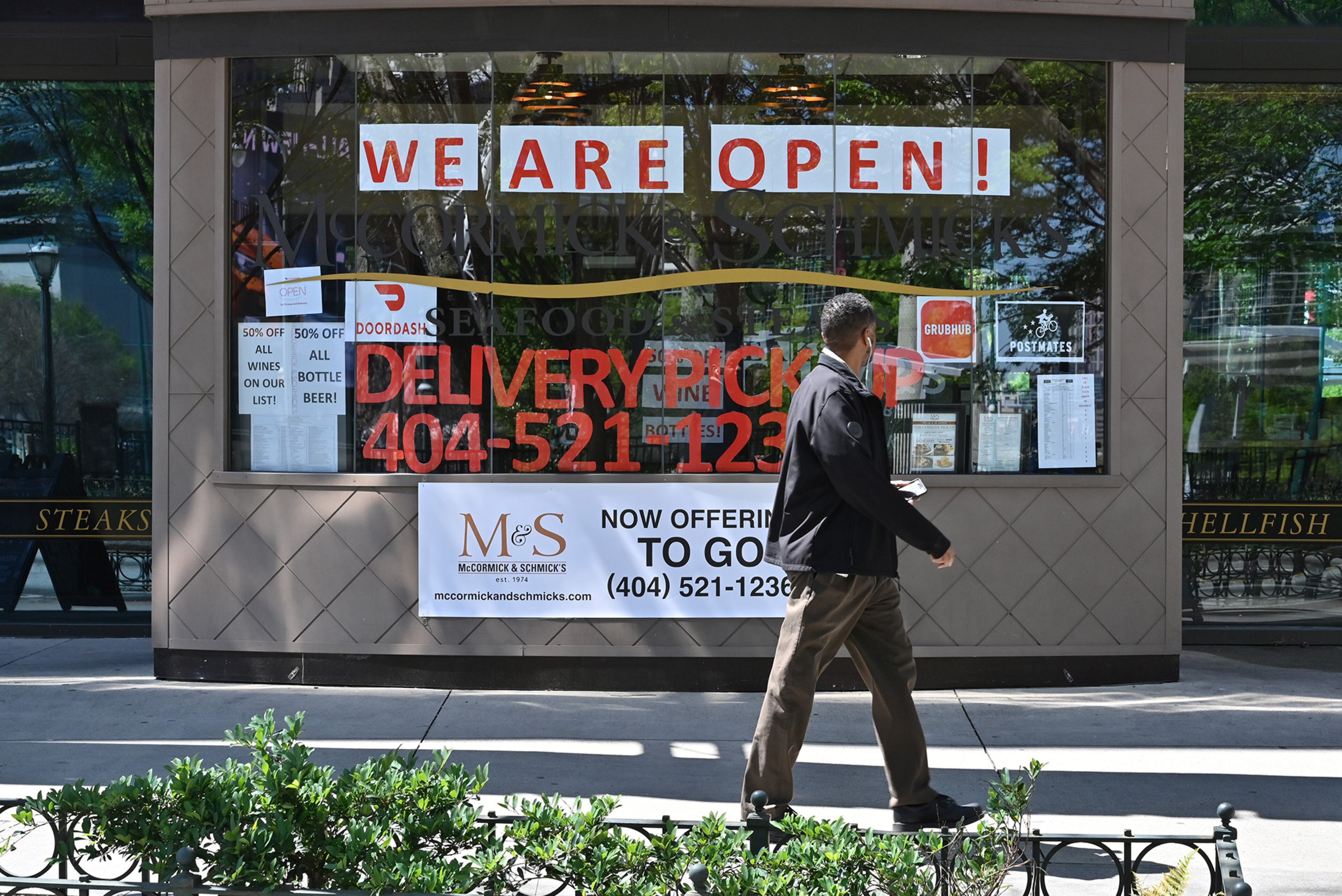 (EDNOTE: "Emptiness") April 2, 2020 Atlanta - McCormick & Schmick's Seafood & Steaks at the CNN Center is seen empty on Thursday, April 2, 2020. Facing such grim outcomes, Gov. Brian Kemp announced Wednesday that he would issue a statewide stay-at-home order. The order will be in force from Friday through at least April 13. (Hyosub Shin / Hyosub.Shin@ajc.com)