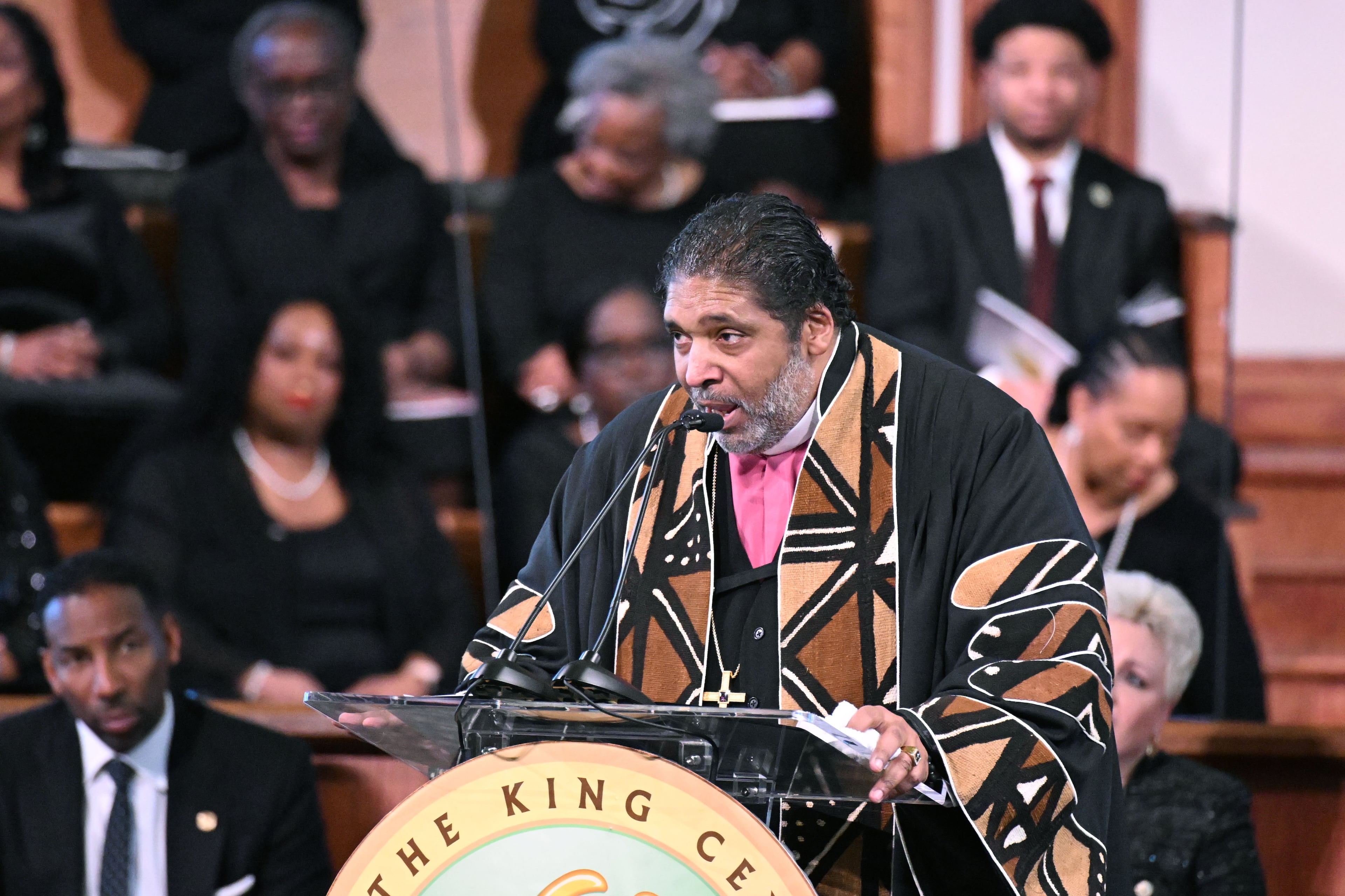 Rev. Dr. William J. Barber II delivers keynote speech during the 57th Martin Luther King, Jr. Beloved Community Commemorative Service at Ebenezer Baptist Church, Monday, January 20, 2025, in Atlanta. (Hyosub Shin / AJC)