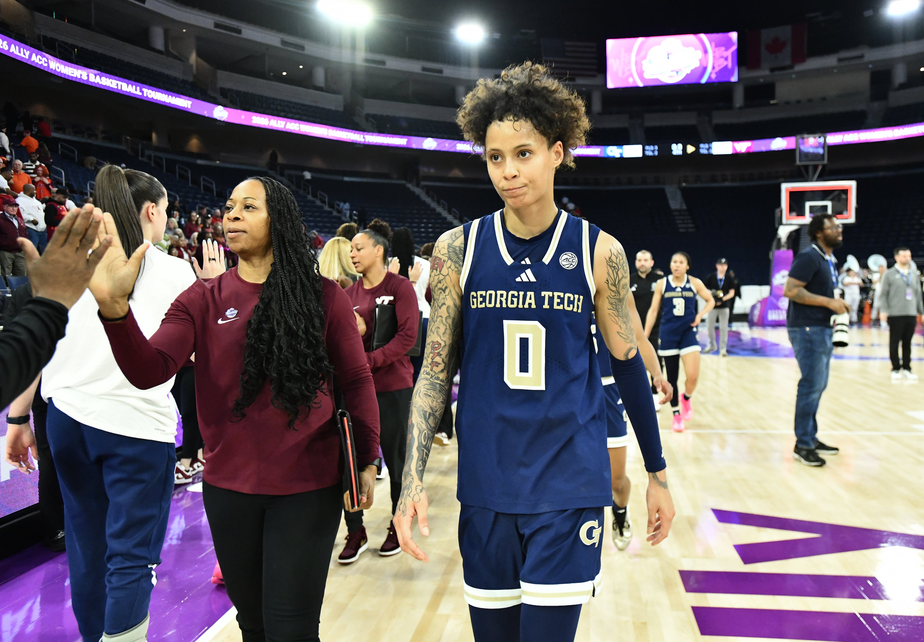 Georgia Tech guard Brianna Turnage leaves the court after Virginia Tech defeat Georgia Tech in the ACC women’s basketball tournament at Gas South Arena on Thursday, March 5, 2026, in Duluth. The Hokies won 62-54 over the Yellow Jackets. (Hyosub Shin/AJC)